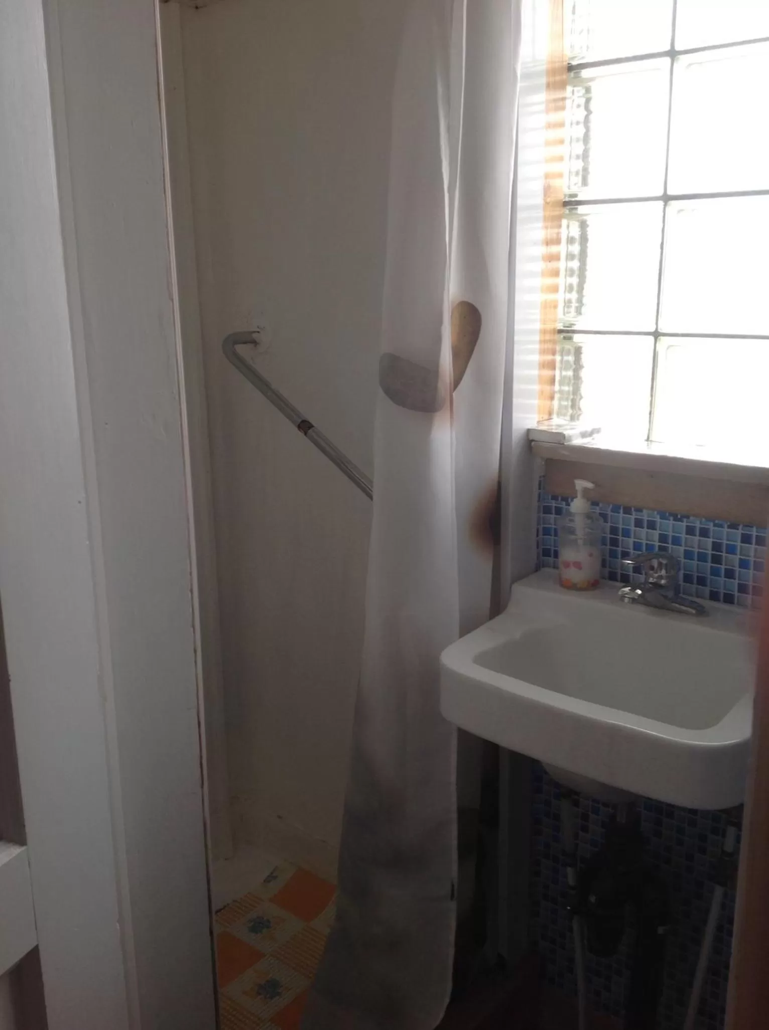 Shower in Heritage Place Hotel