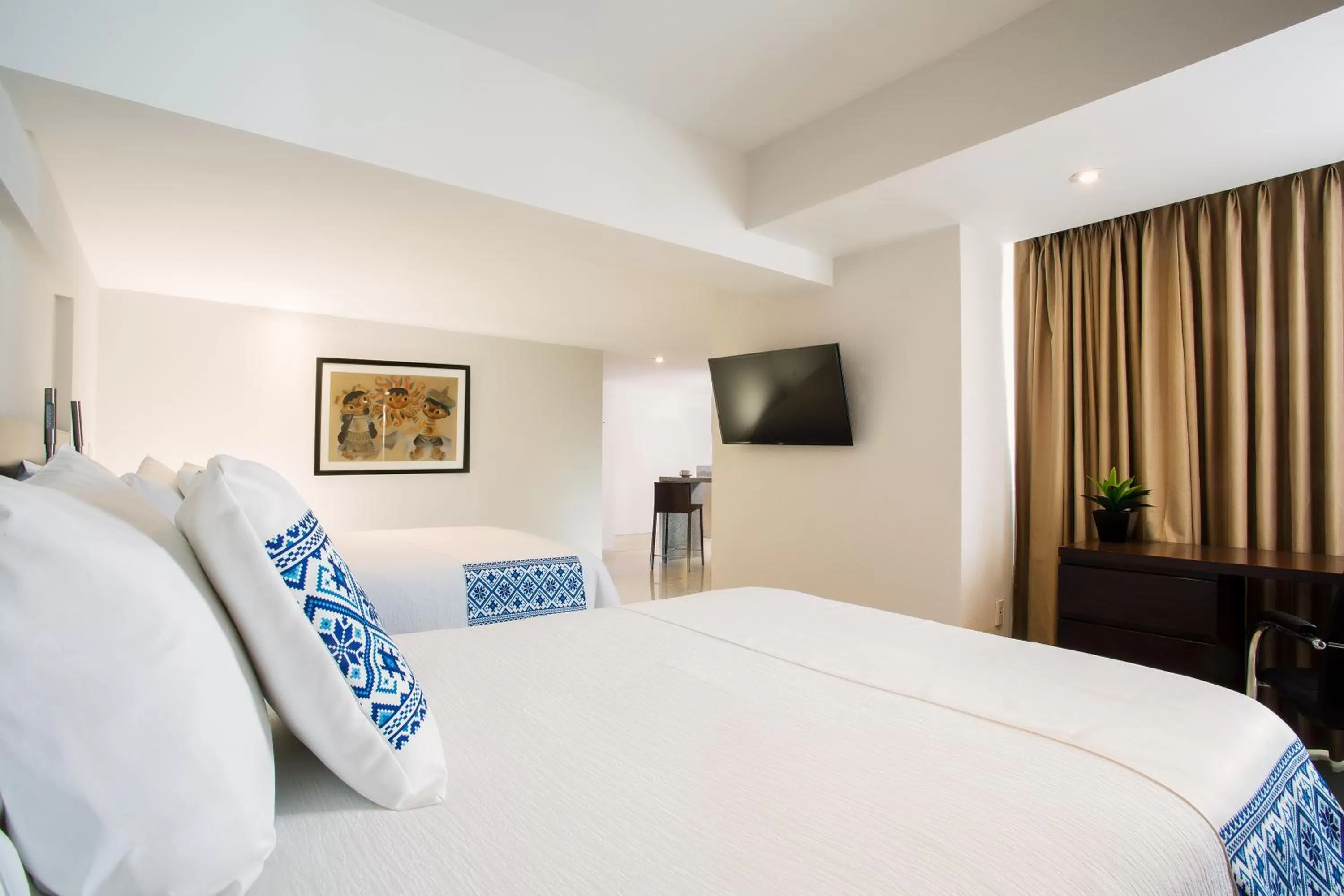 Bed in Hotel Indigo Guadalajara Expo by IHG