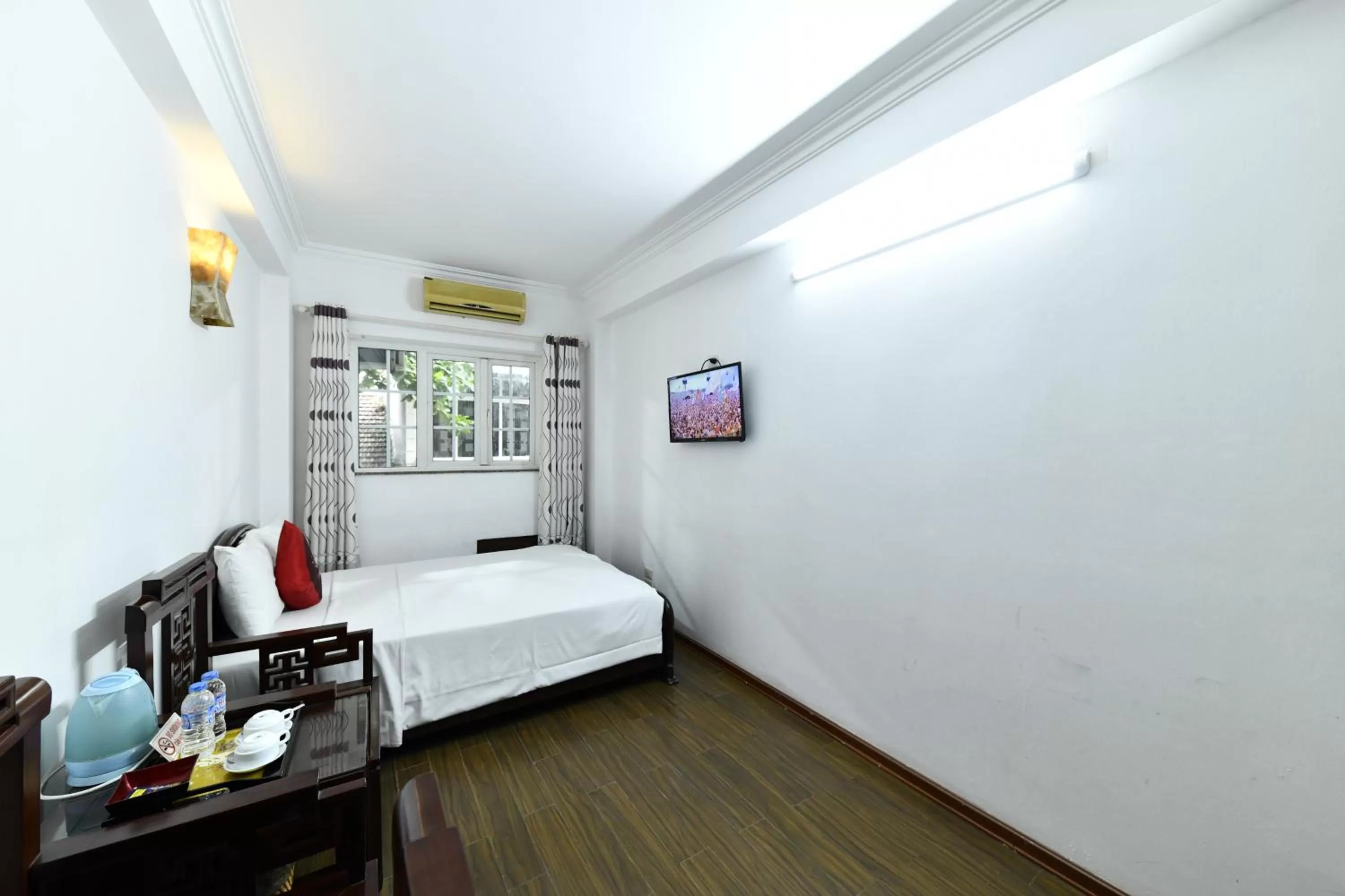 Bed in Phoenix Legend Hotel Hanoi