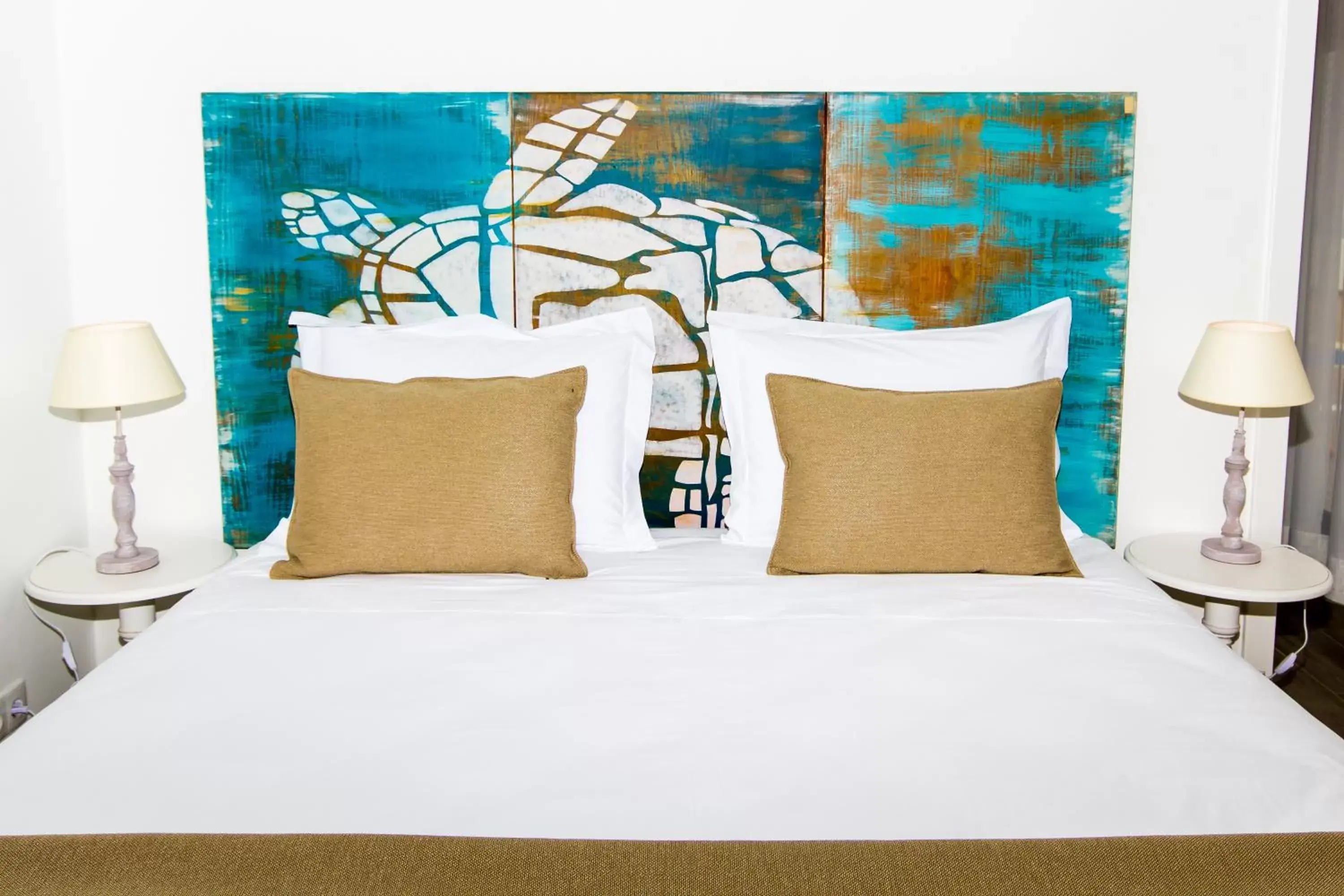 Bed in Mareta Beach House - Boutique Residence