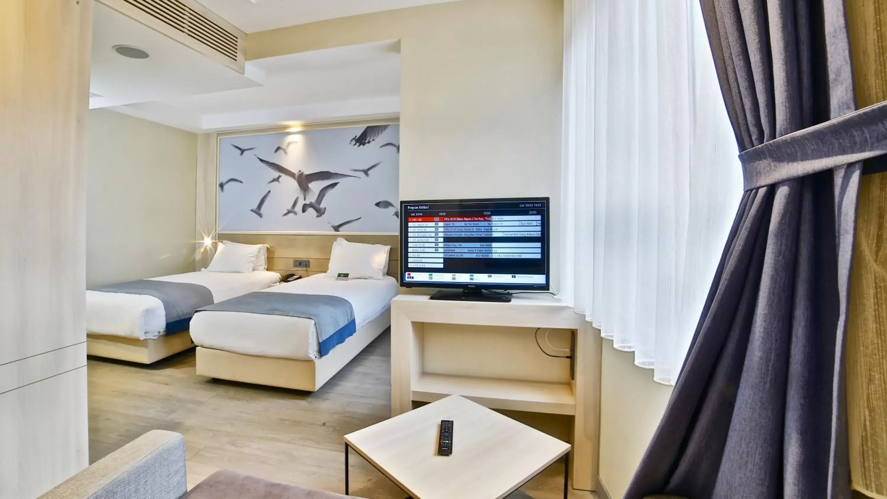 Photo of the whole room, TV/Entertainment Center in Ramada by Wyndham Istanbul Old City