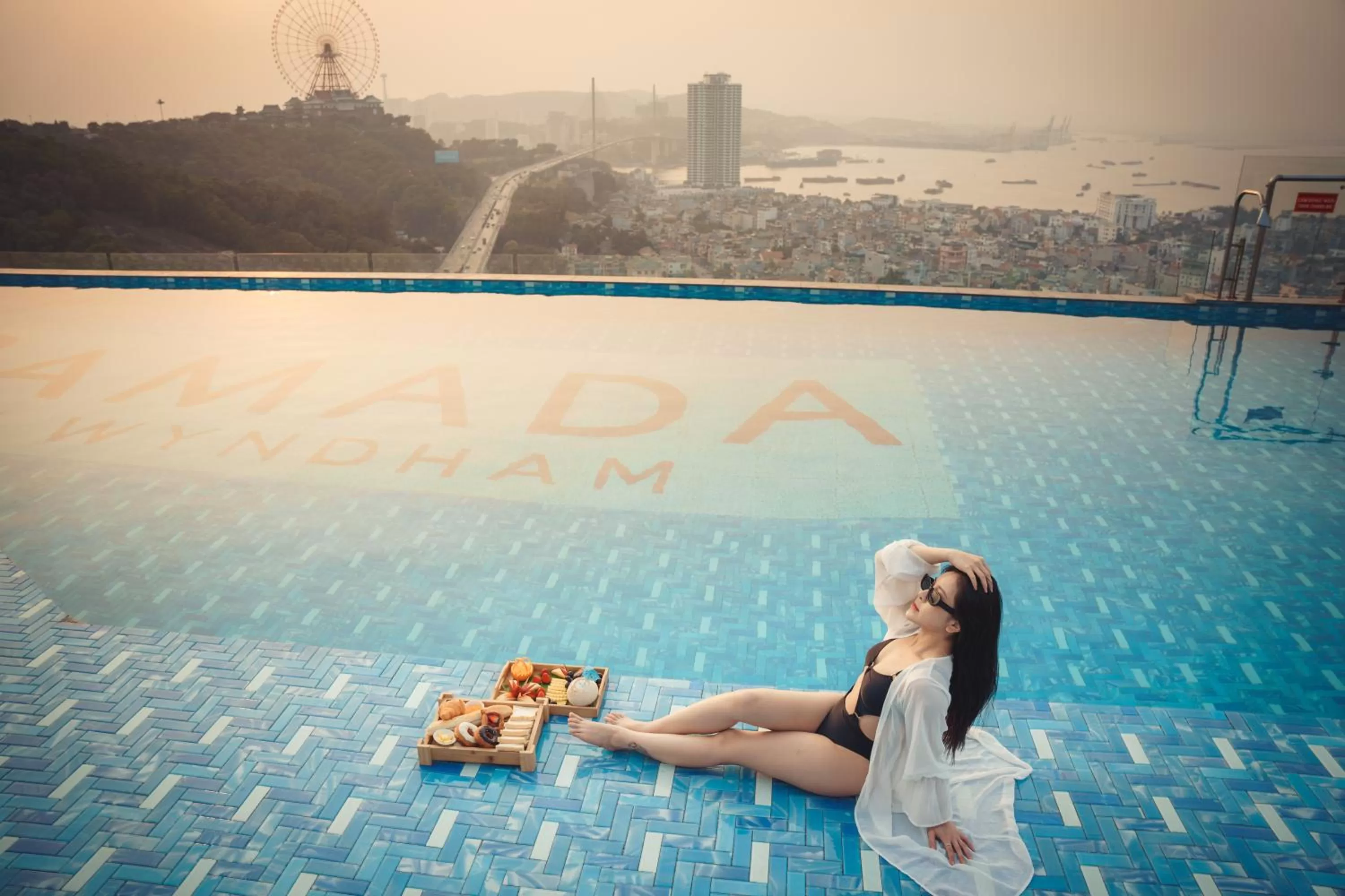 Swimming pool in Ramada Hotel & Suites by Wyndham Halong Bay View