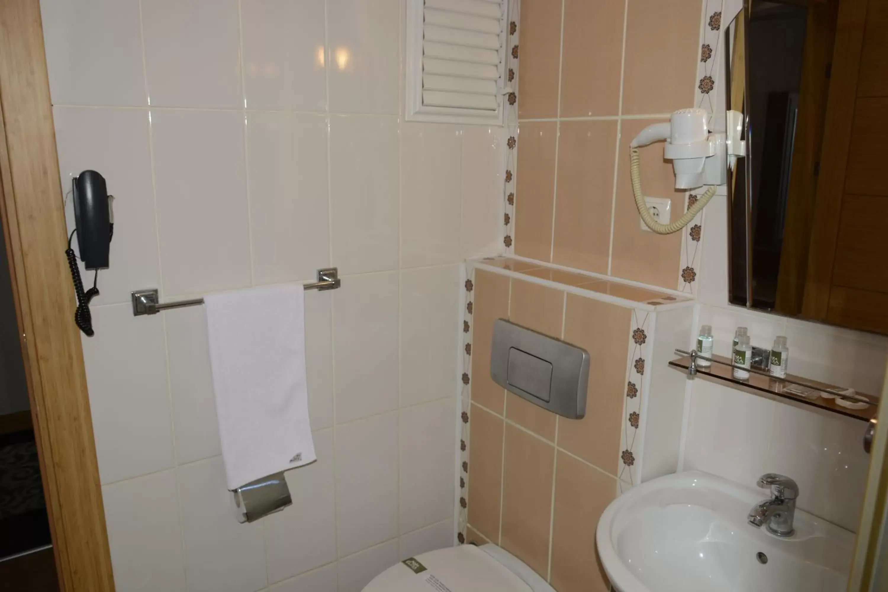 Property building, Bathroom in Hermanos Hotel