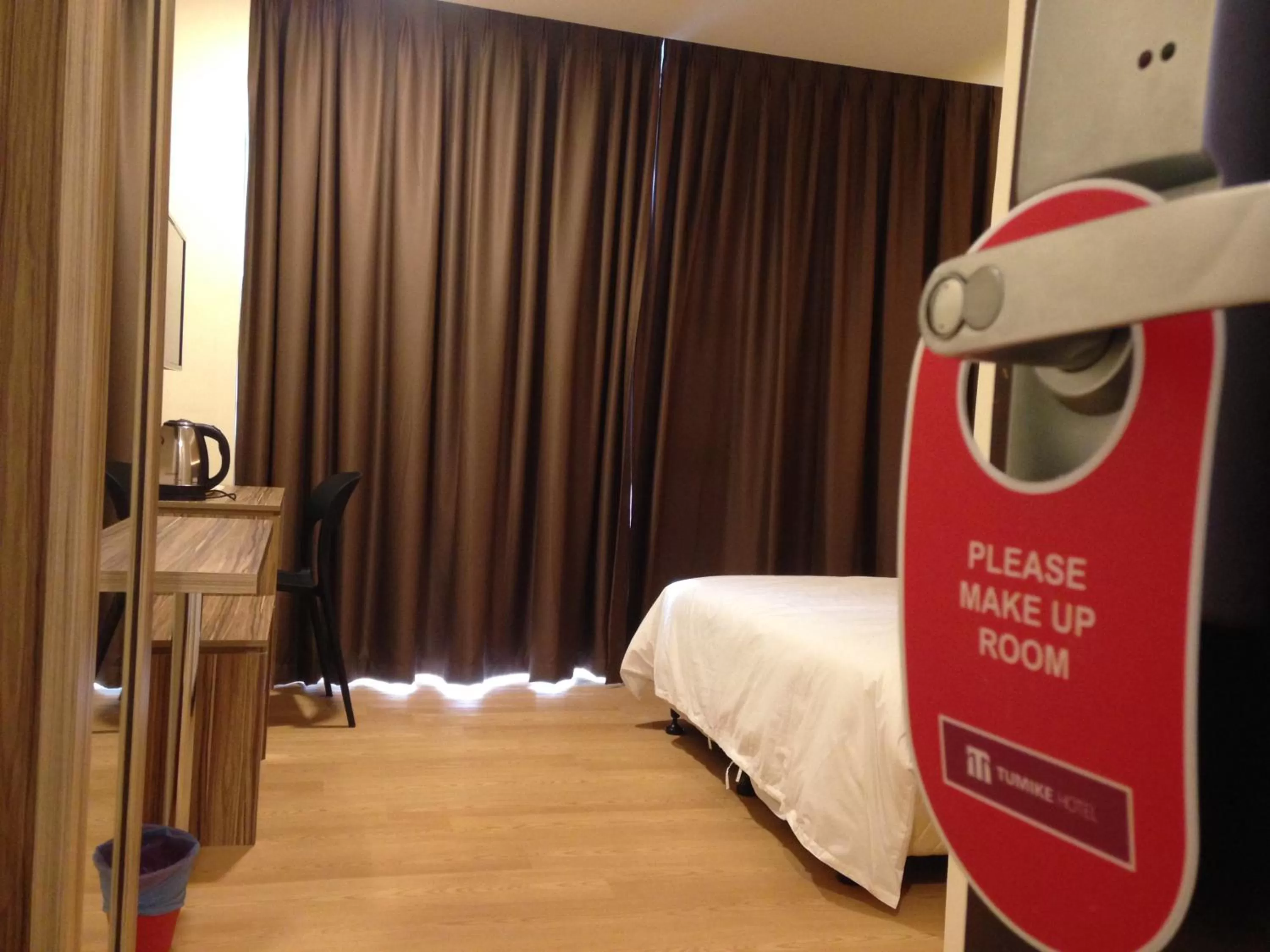 Bed in Tumike Hotel Bentong