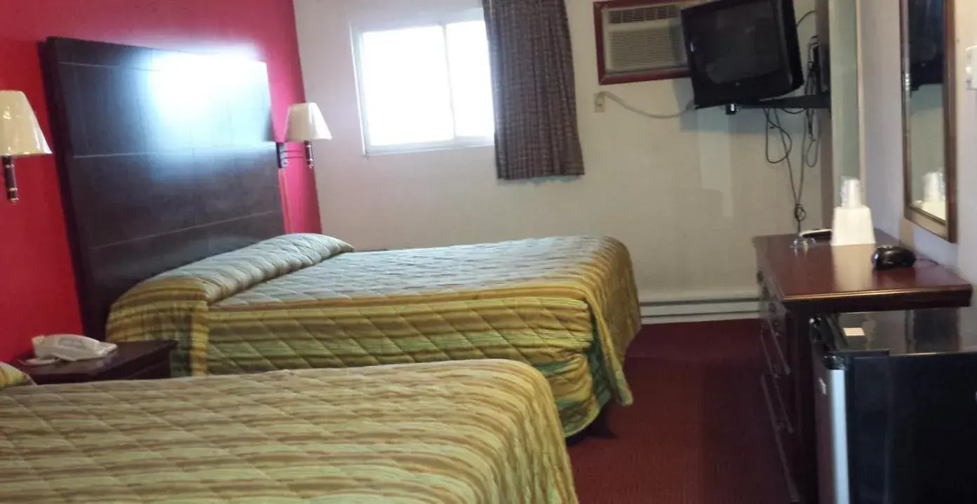 Bed in Hallmark Motel