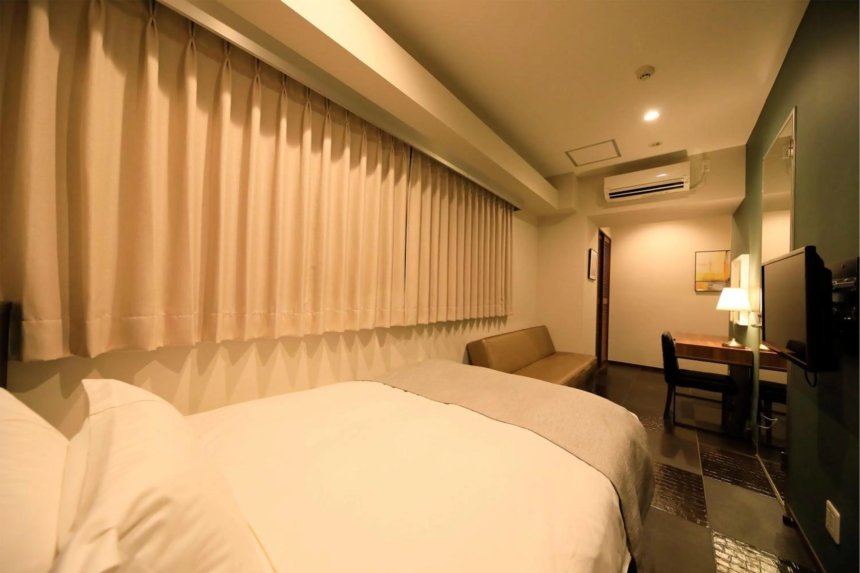 Photo of the whole room, Bed in Centurion Hotel Residential Akasaka Station