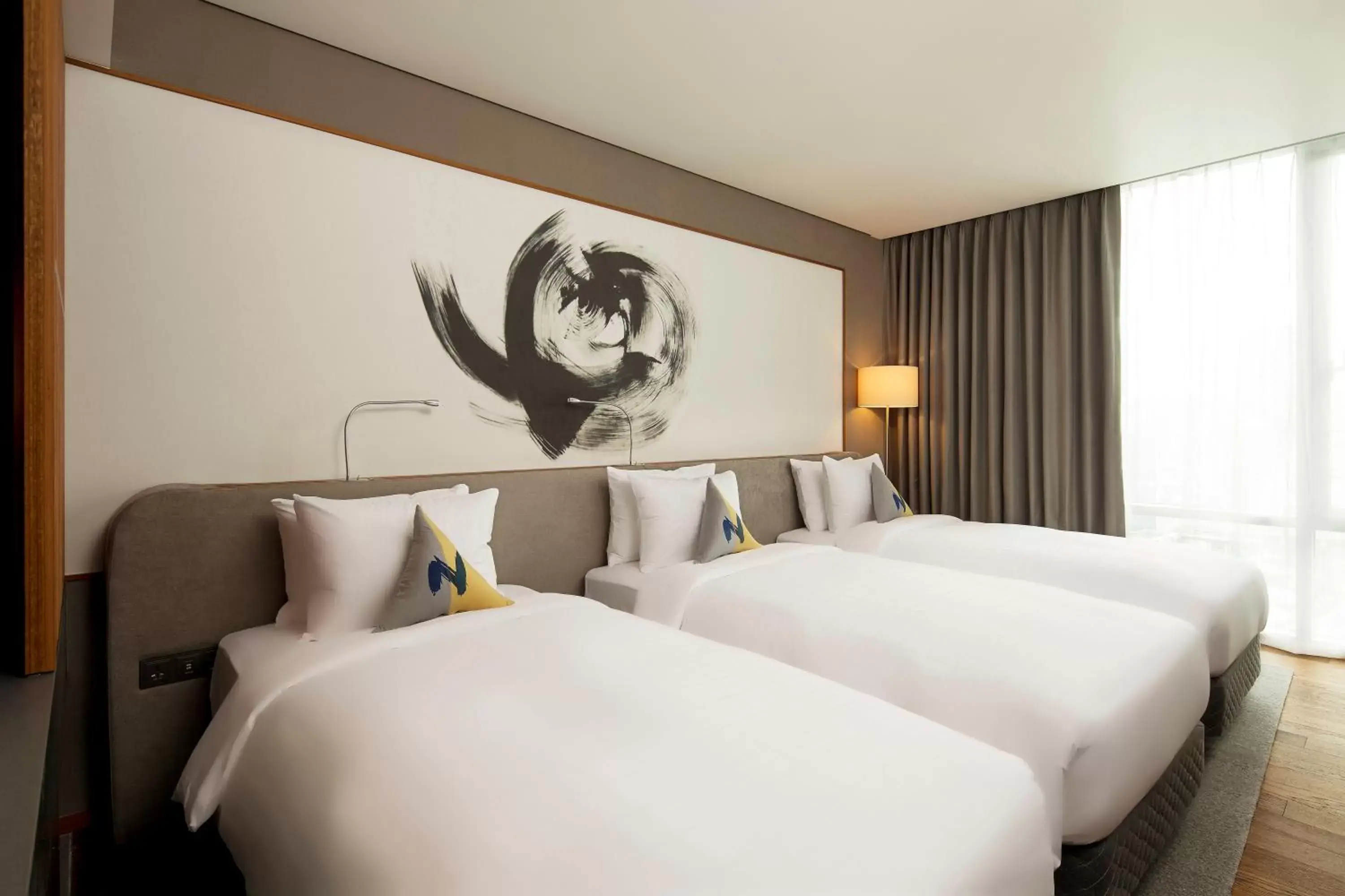 Bed in Novotel Ambassador Seoul Dongdaemun Hotels & Residences