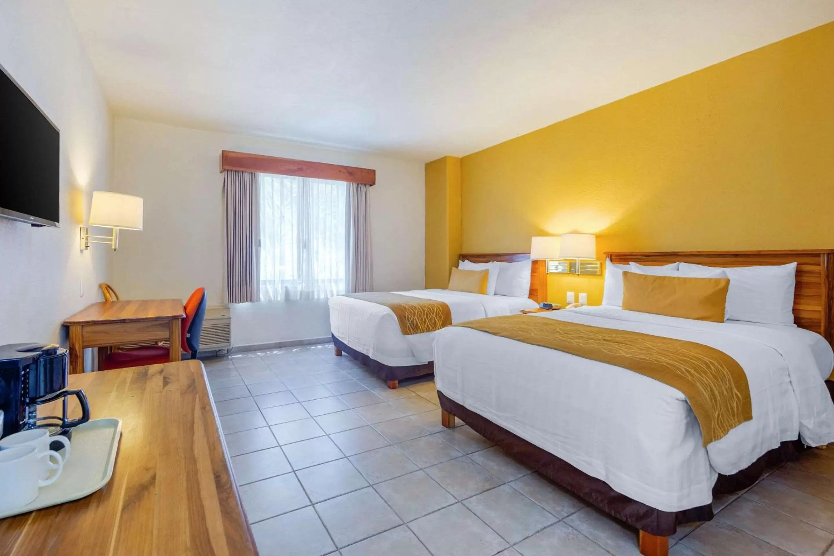 Photo of the whole room, Bed in Comfort Inn Tampico