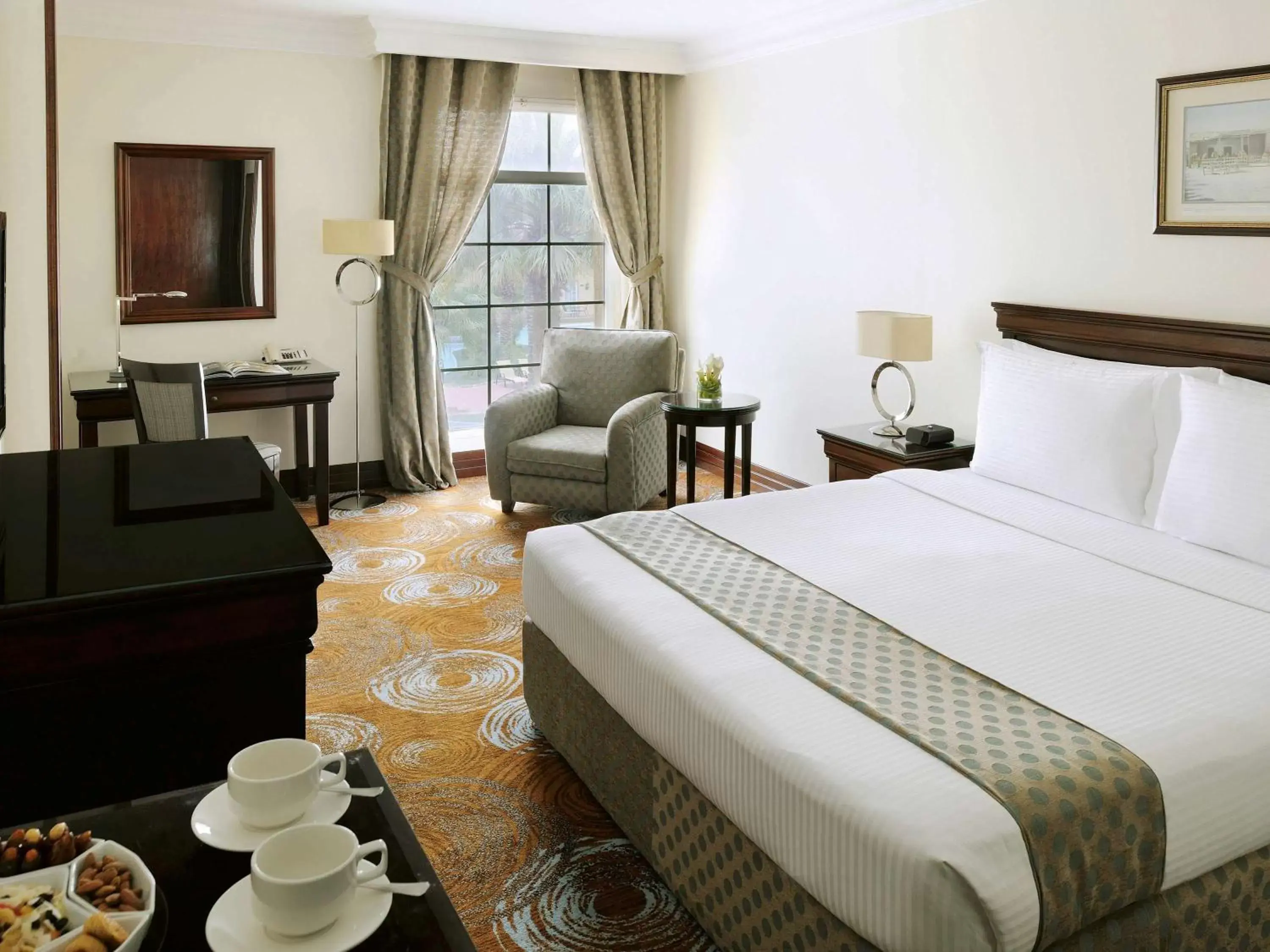 Photo of the whole room, Bed in Mövenpick Hotel Kuwait Photo of the whole room, Bed in Mövenpick Hotel Kuwait