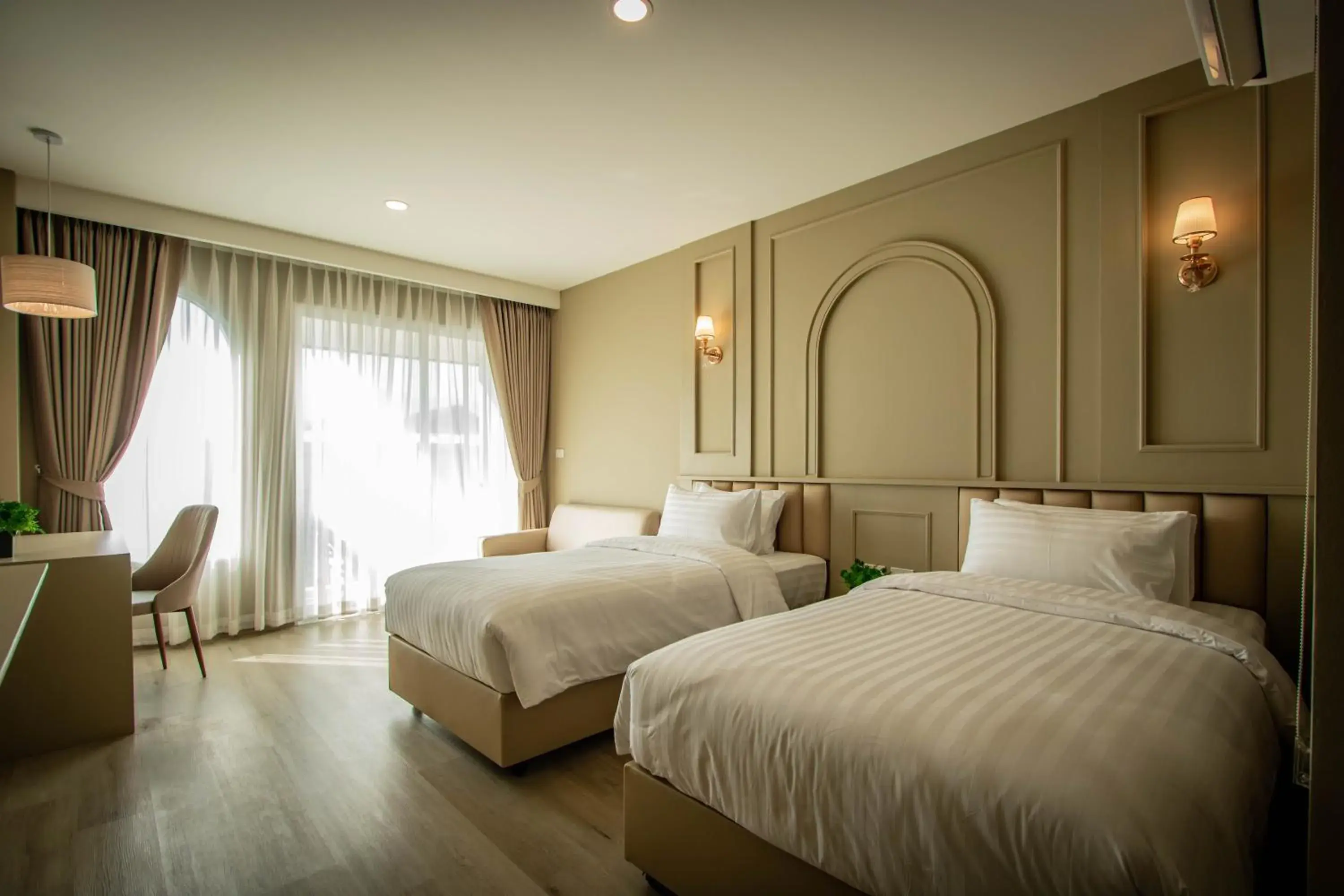 Bed in Eurana Boutique Hotel