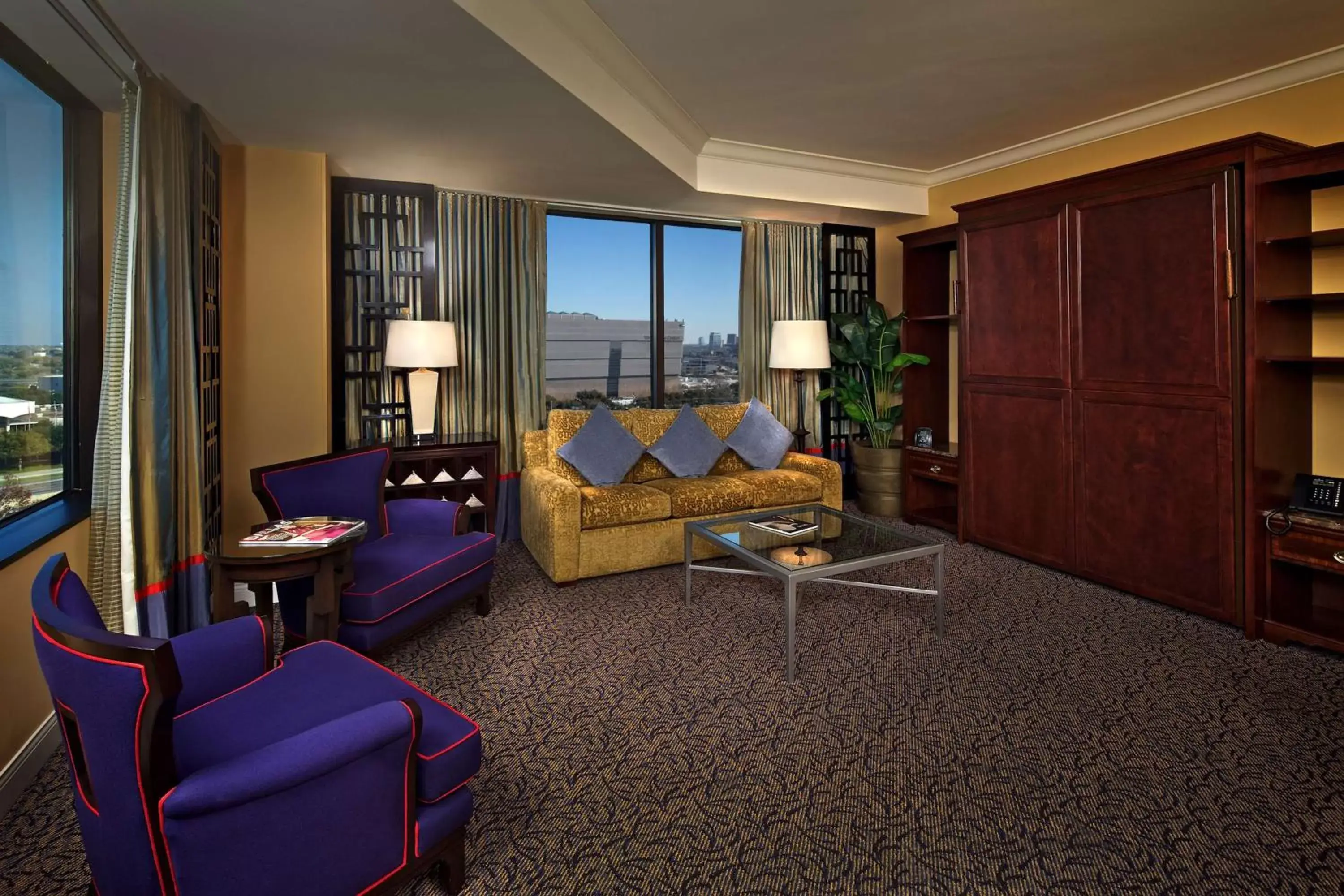 Bed, Seating Area in Hilton Anatole