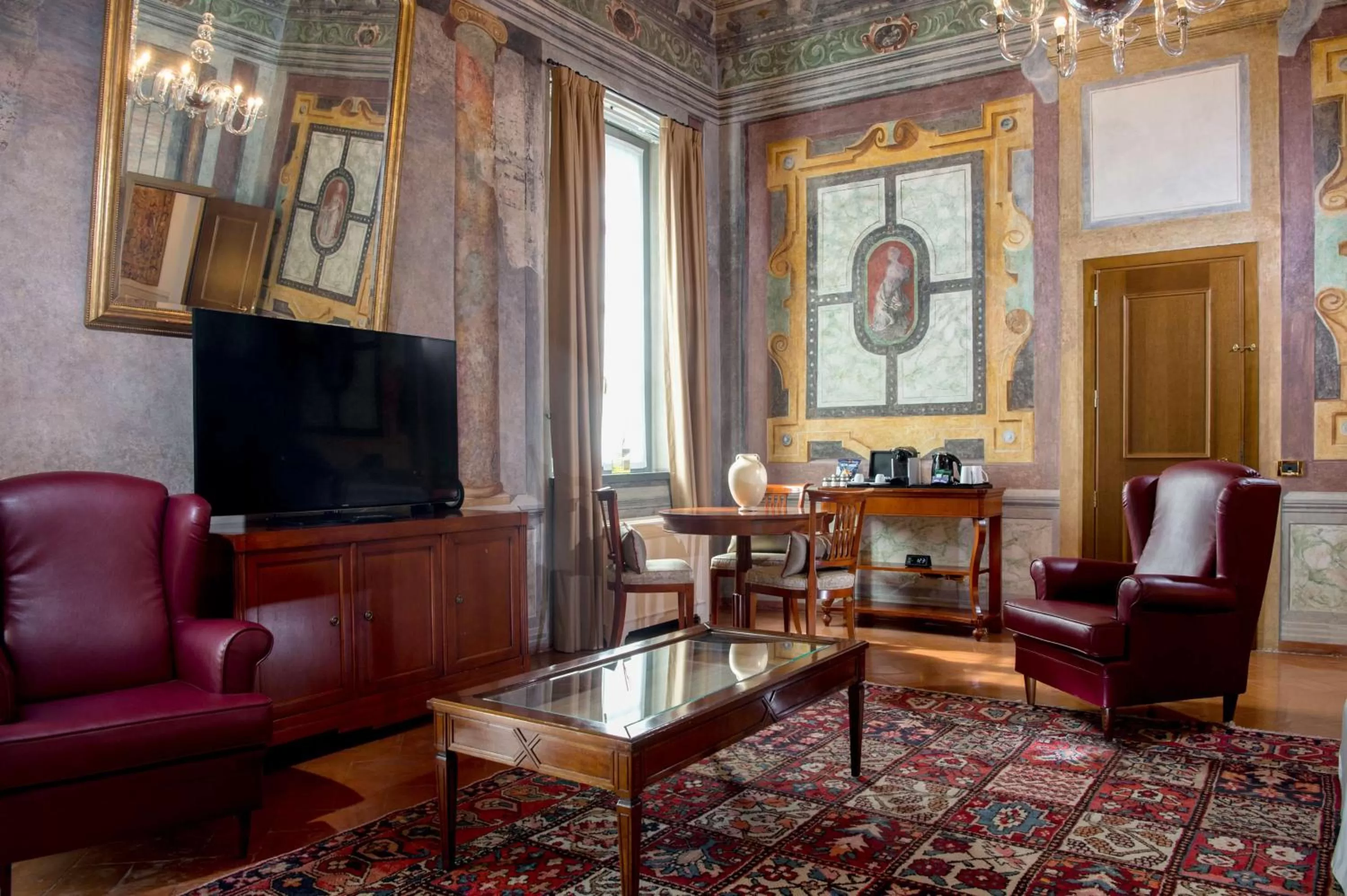 Living room in Grand Hotel Villa Torretta, Curio Collection by Hilton