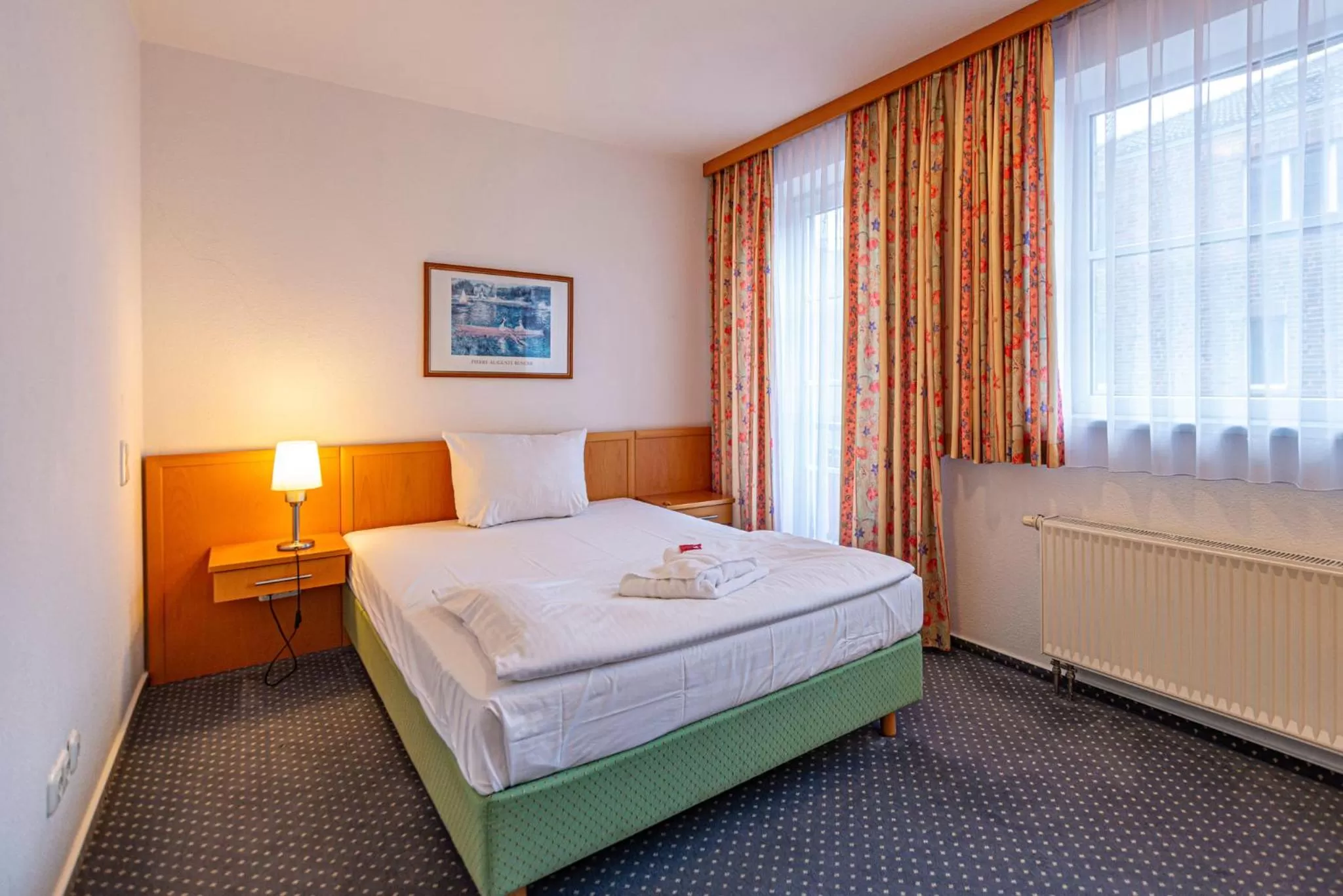 Photo of the whole room, Bed in Hotel Rostock West im "Kritzmow Park"