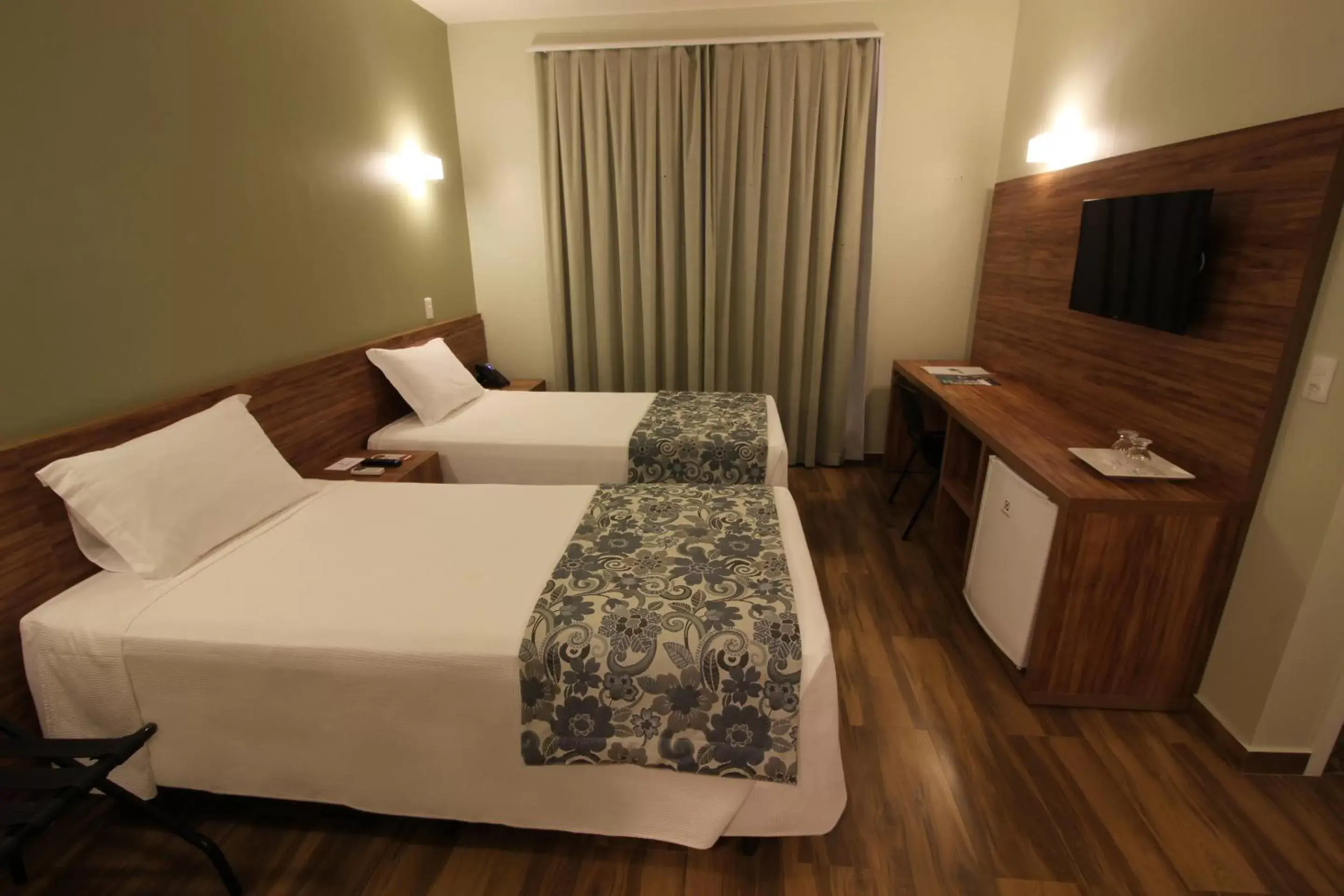 Bed in Impar Suites Barao de Cocais