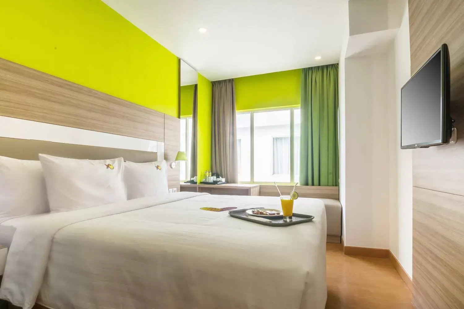 Bed in MaxOneHotels at Resort Makassar