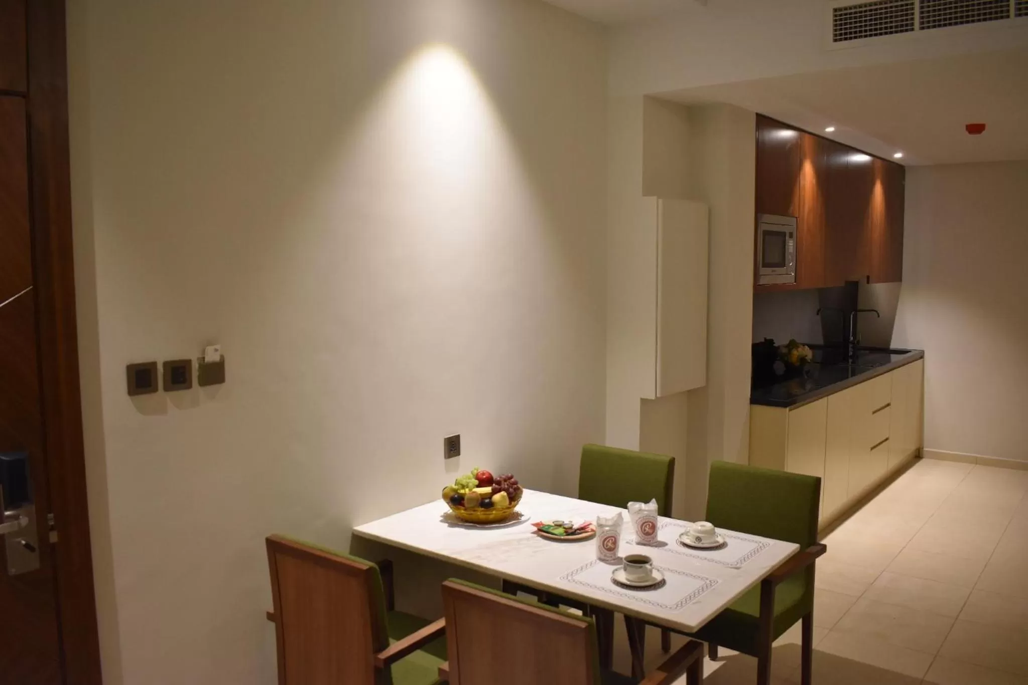 Kitchen or kitchenette in Ramee Palace Hotel