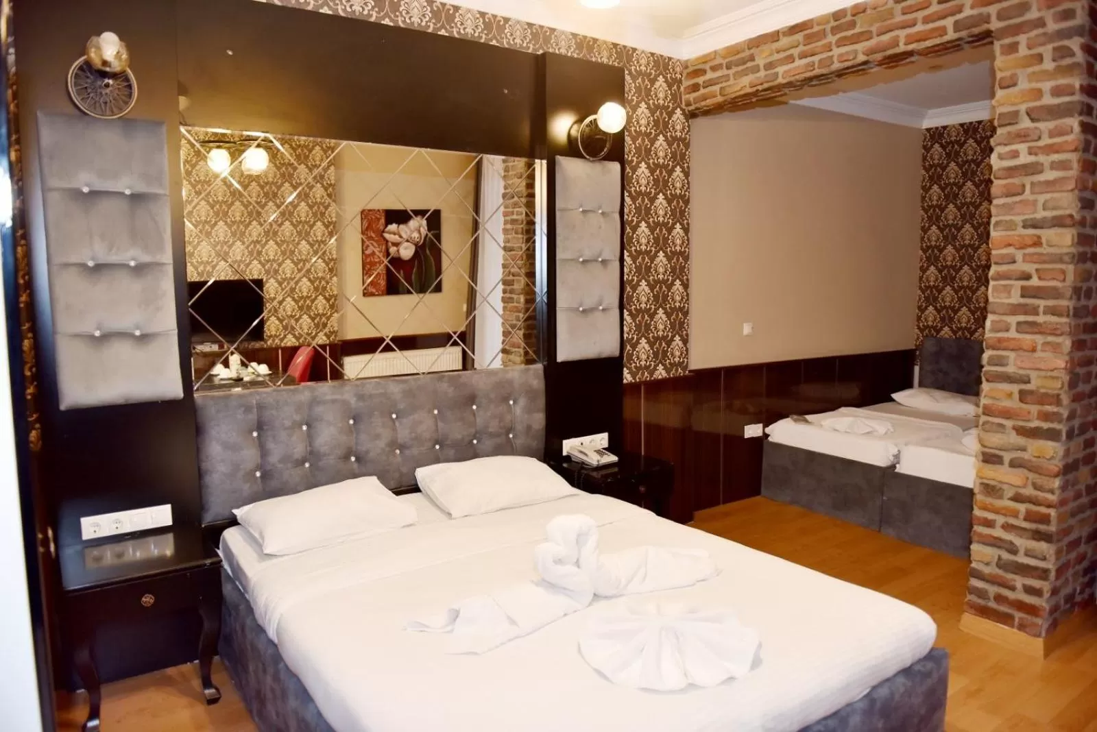 Bed in Royal Palace Hotel