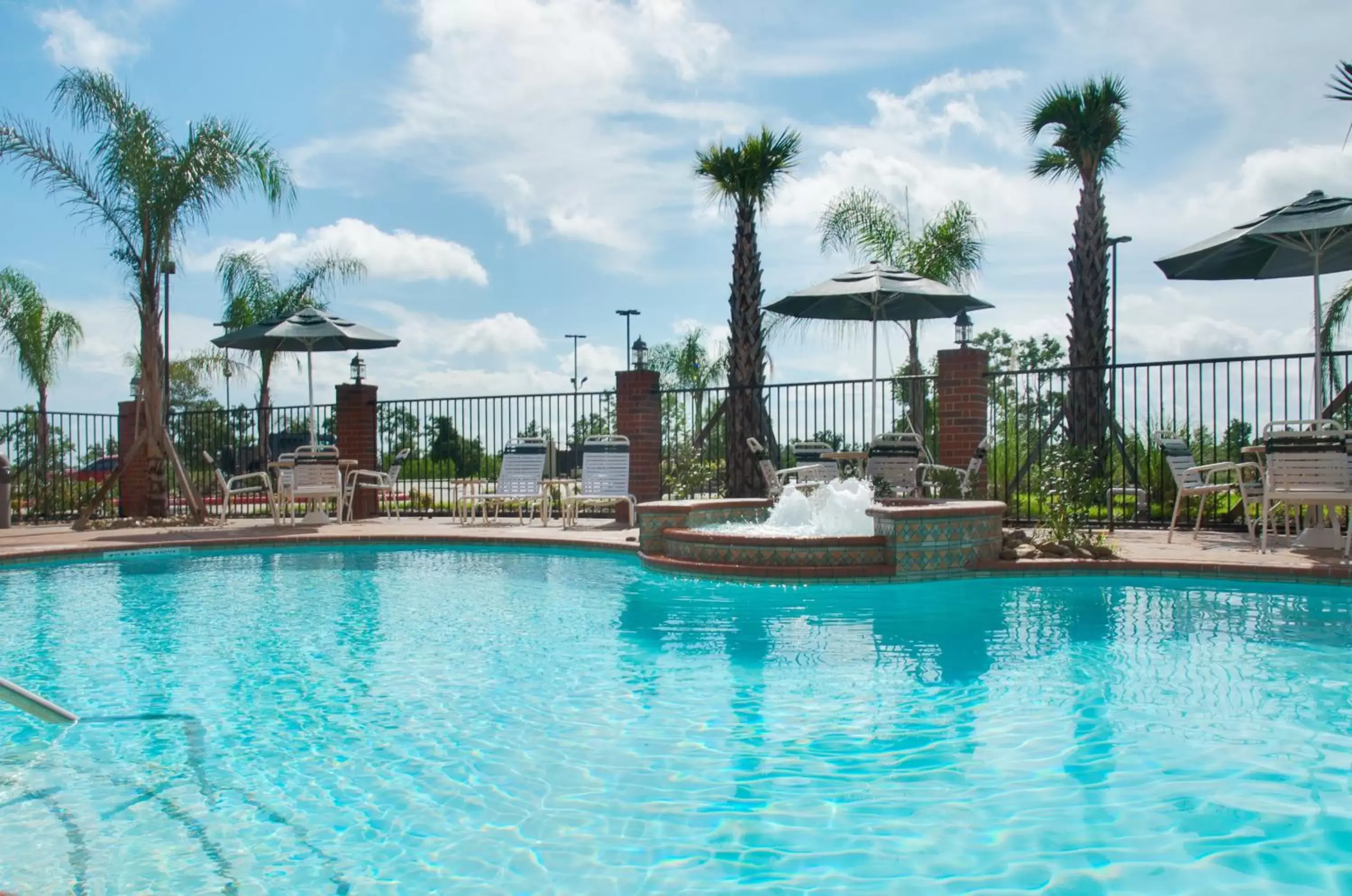 Swimming Pool in Holiday Inn Express Hotel & Suites Winnie, an IHG Hotel