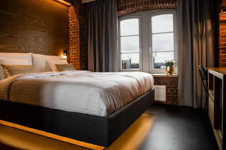 Photo of the whole room, Bed in GINN Hotel Hamburg Elbspeicher