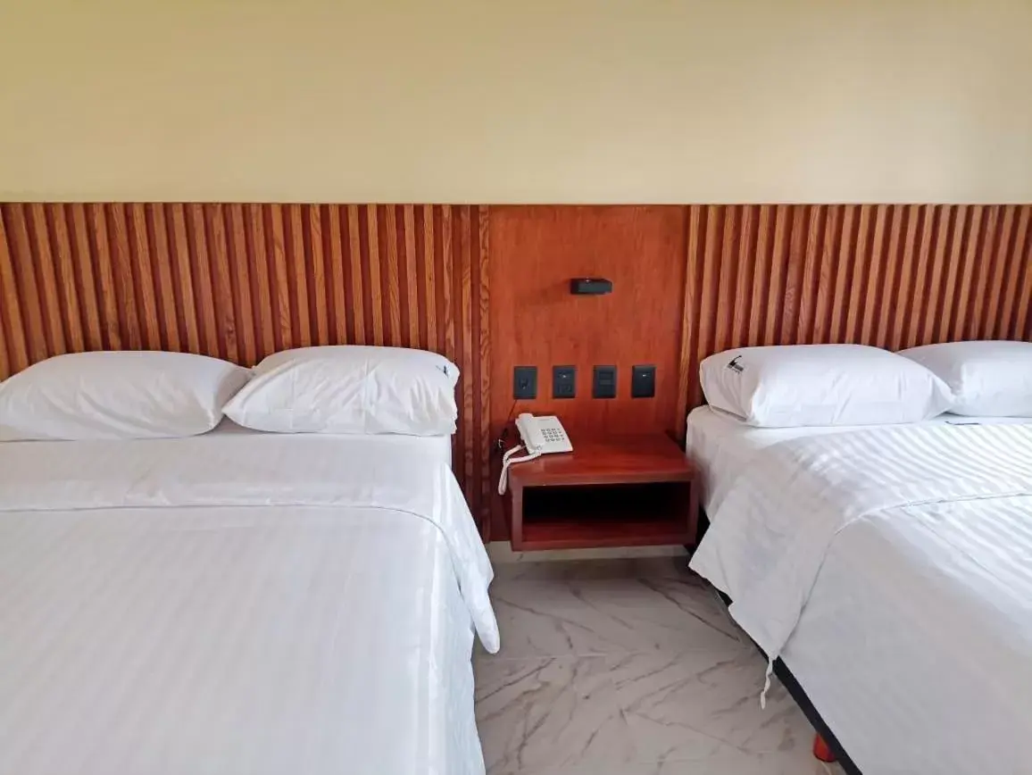 Bed in Hotel Parador