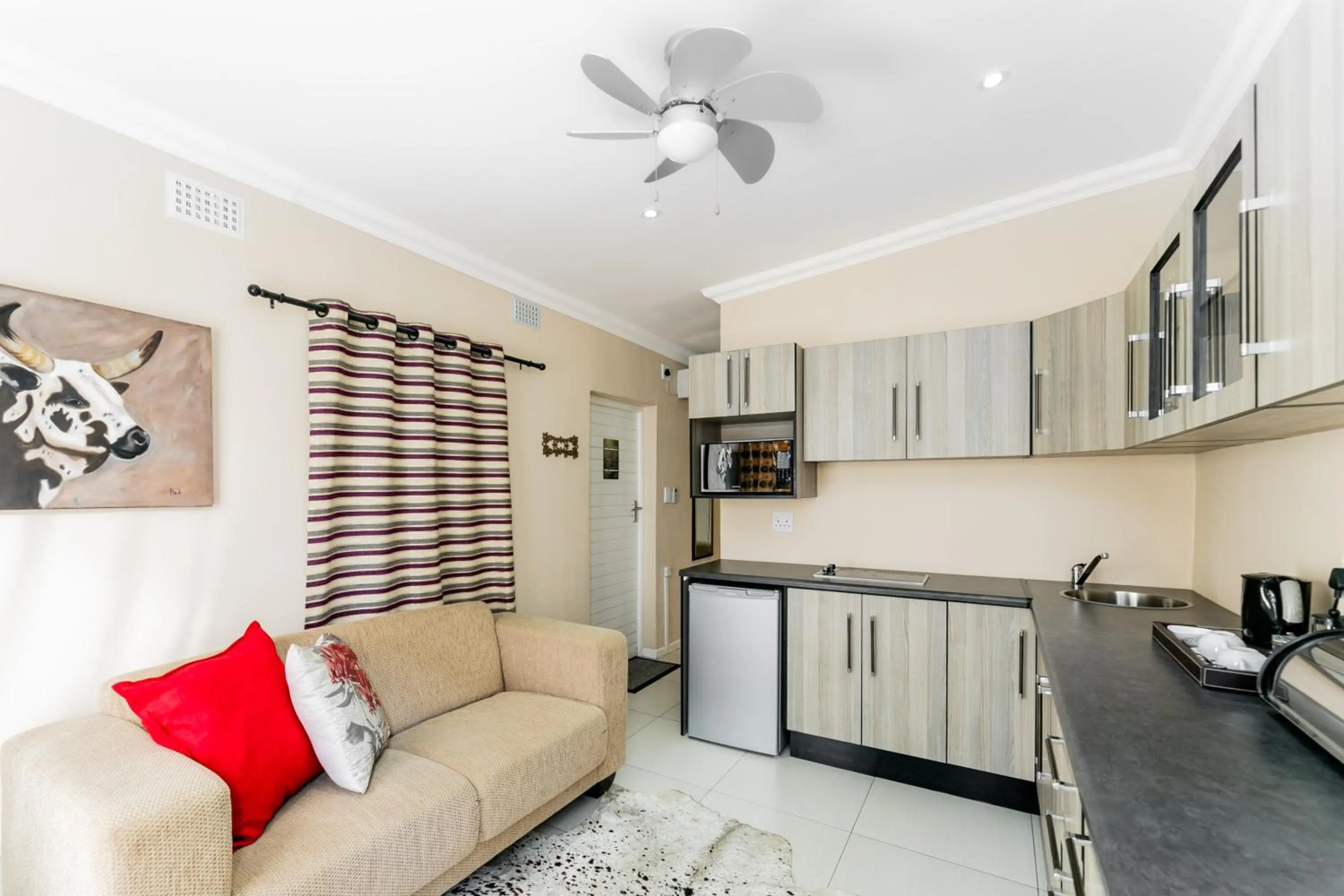 Kitchen or kitchenette in Arum Guest House