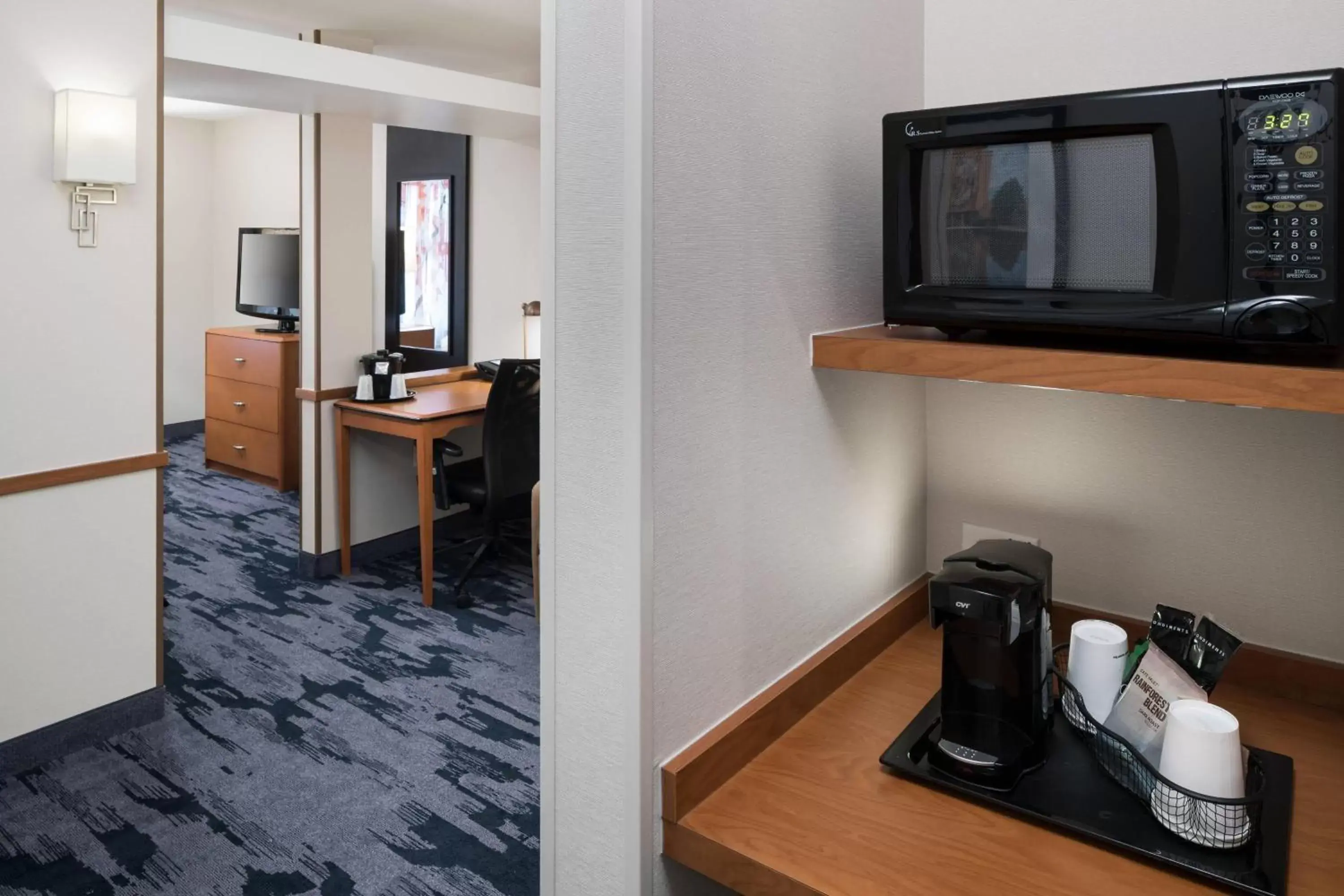 Photo of the whole room, TV/Entertainment Center in Fairfield Inn & Suites South Bend at Notre Dame