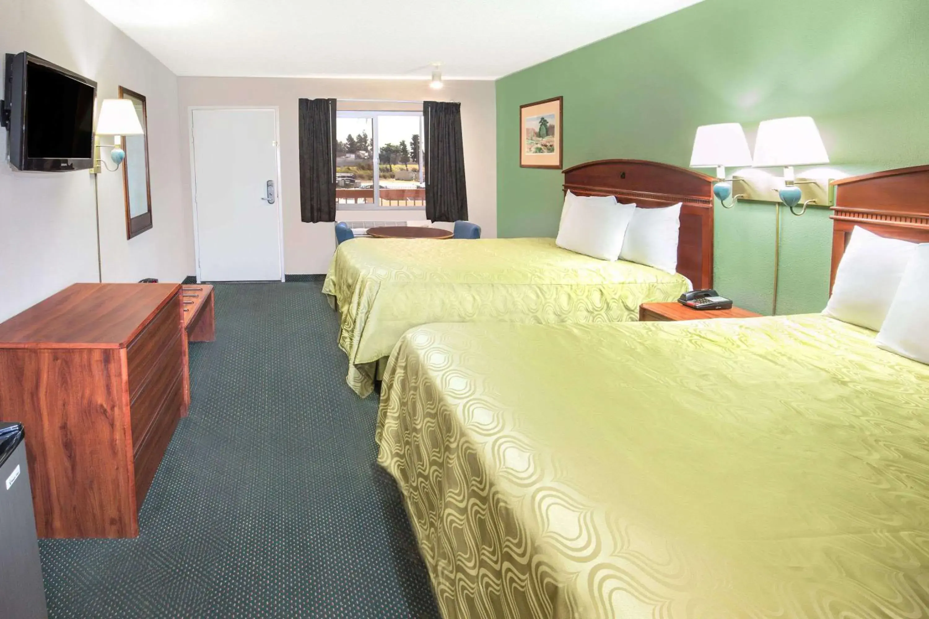 Bedroom in Days Inn by Wyndham Ontario Airport