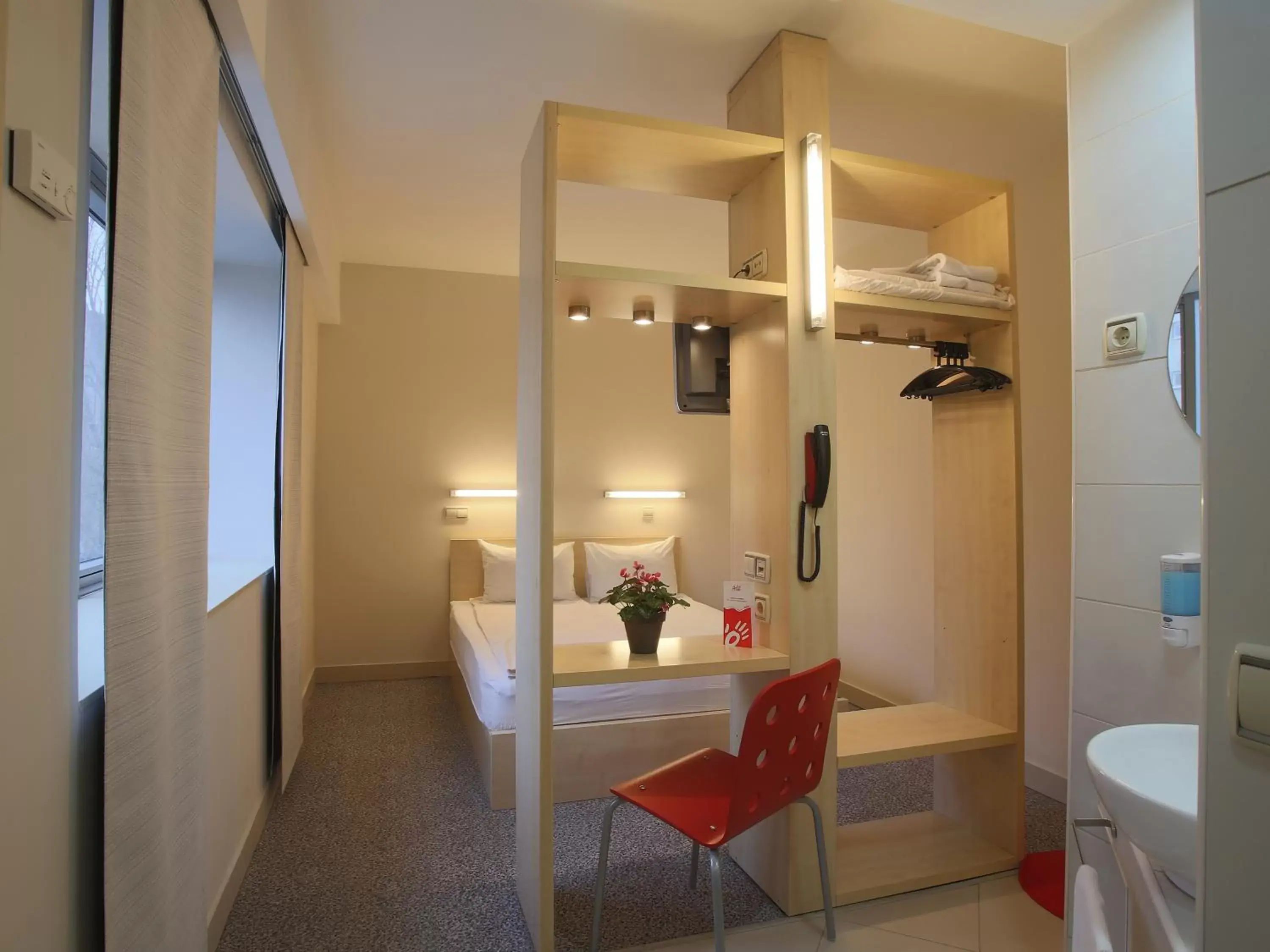 Photo of the whole room, Bathroom in Hello Hotels Gara de Nord