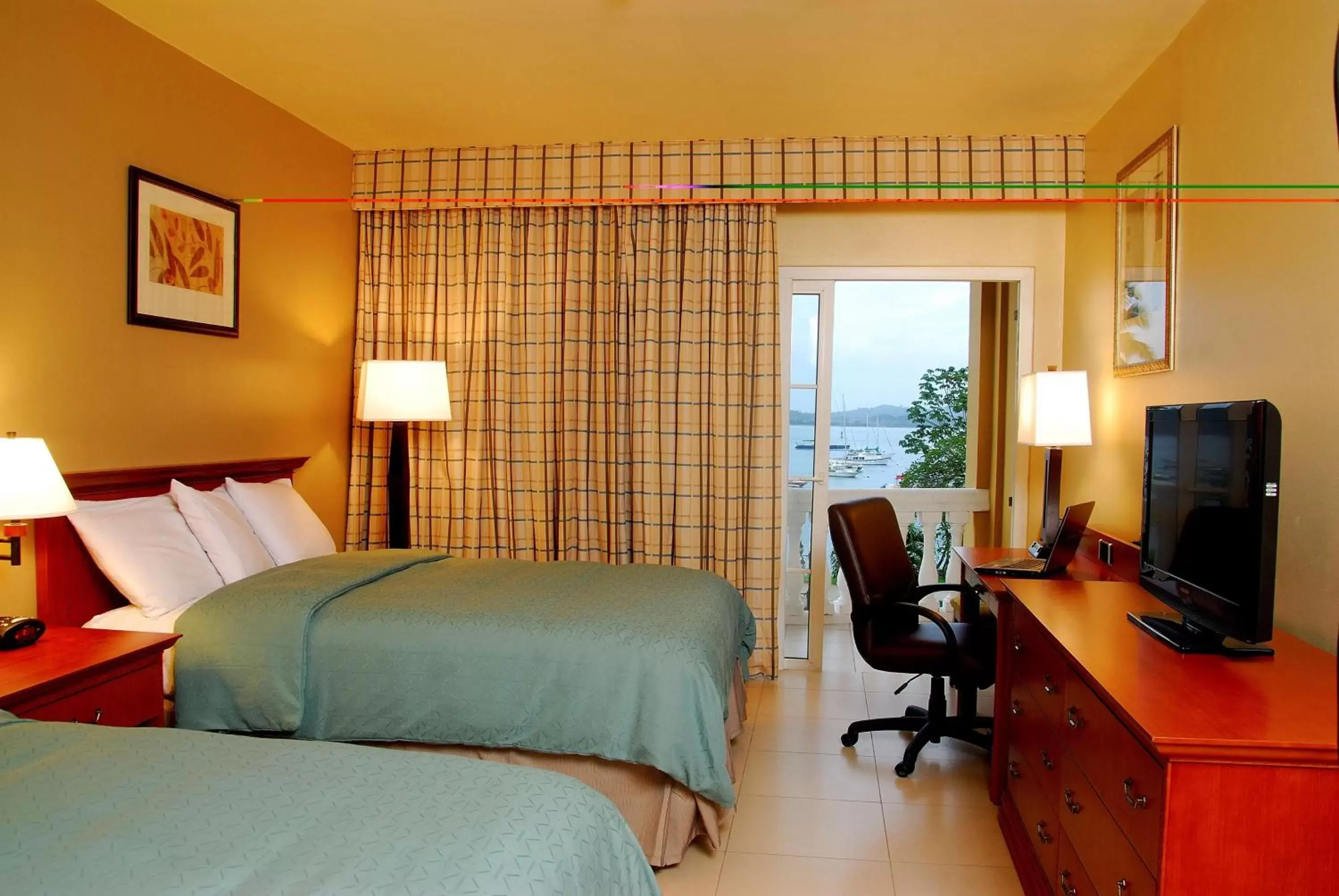 Photo of the whole room, Bed in Radisson Hotel Panama Canal