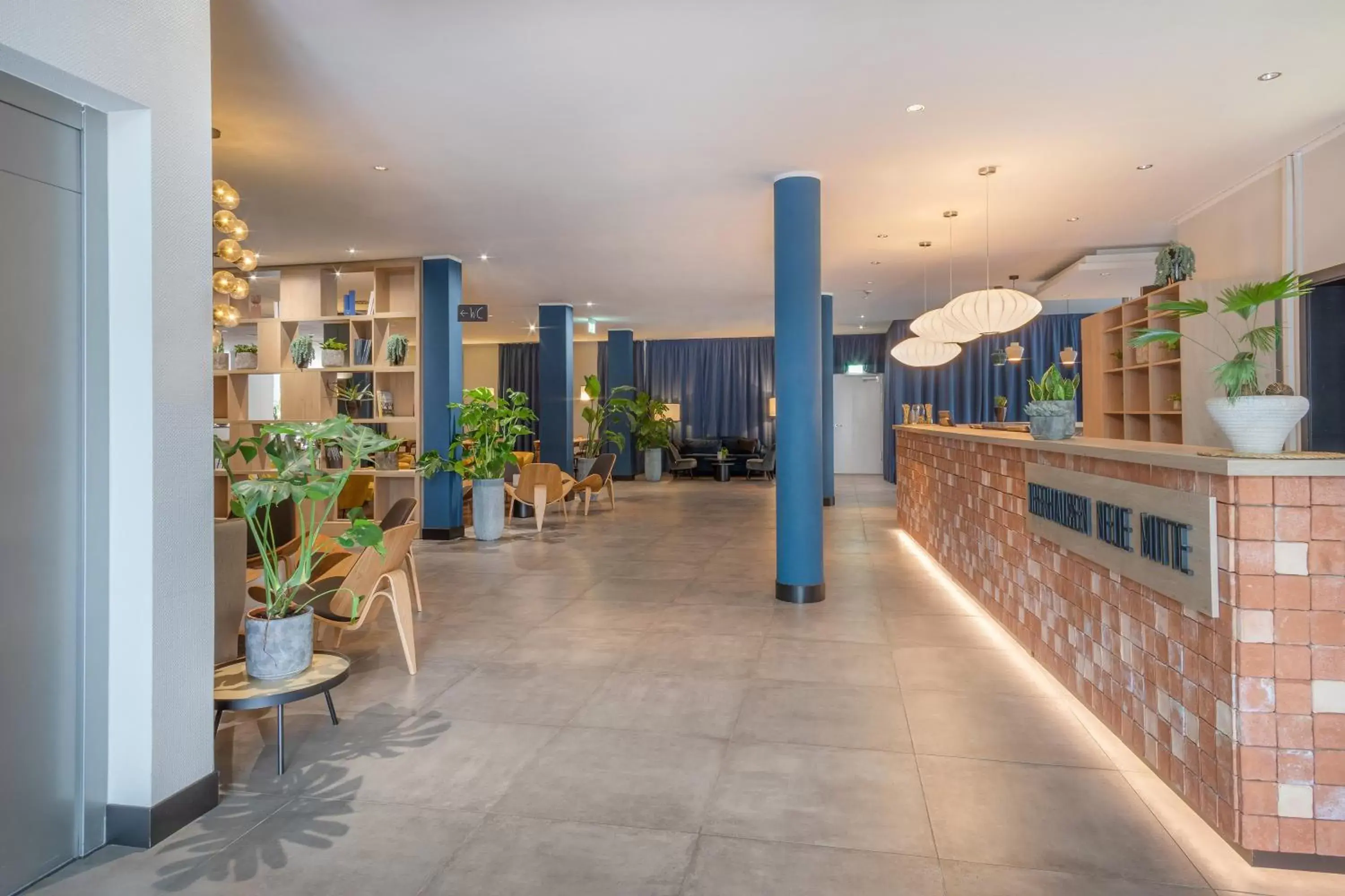 Lobby or reception in Hotel Oberhausen Neue Mitte affiliated by Meliá Lobby or reception in Hotel Oberhausen Neue Mitte affiliated by Meliá