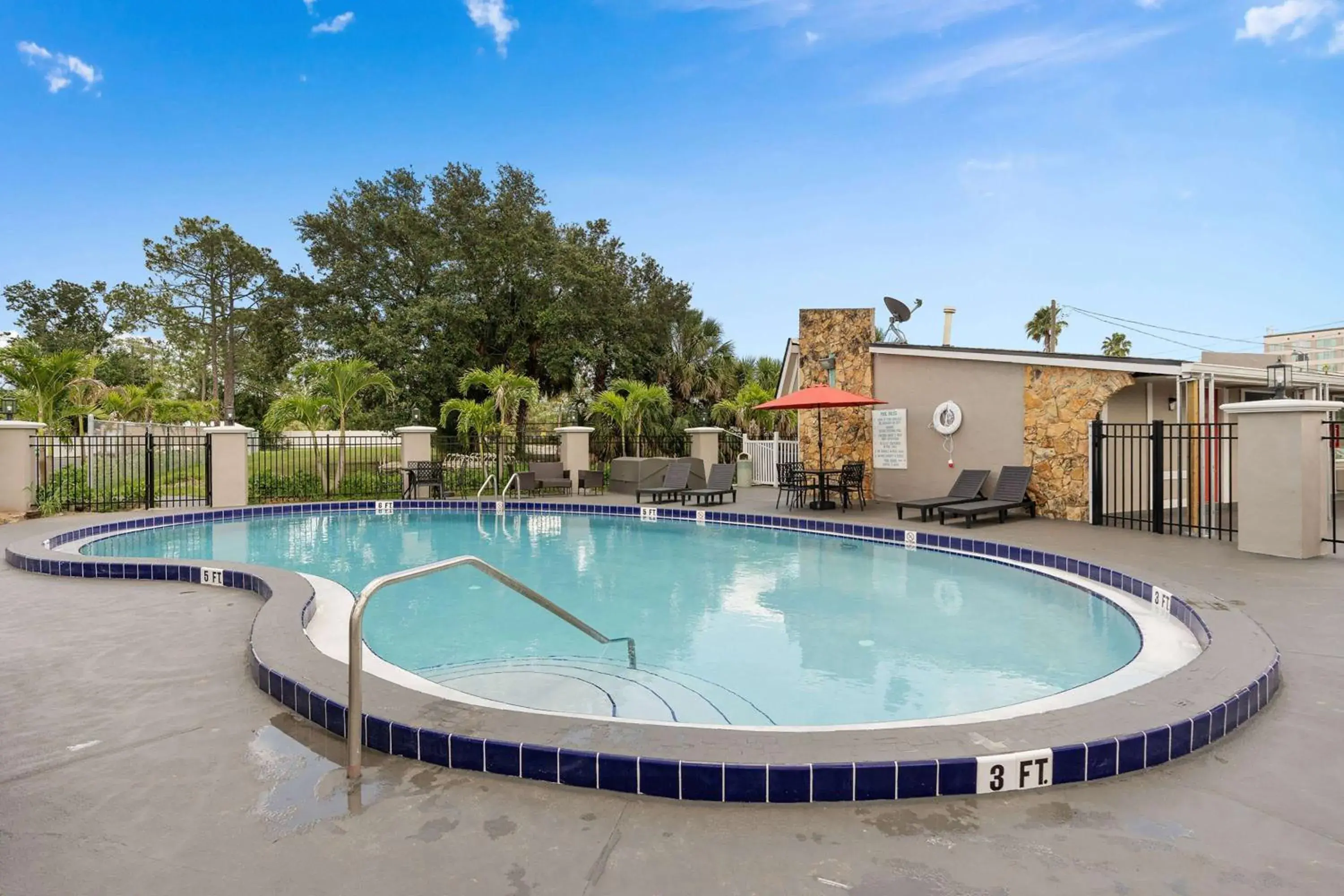 Pool view, Swimming Pool in Super 8 by Wyndham Kissimmee-Orlando