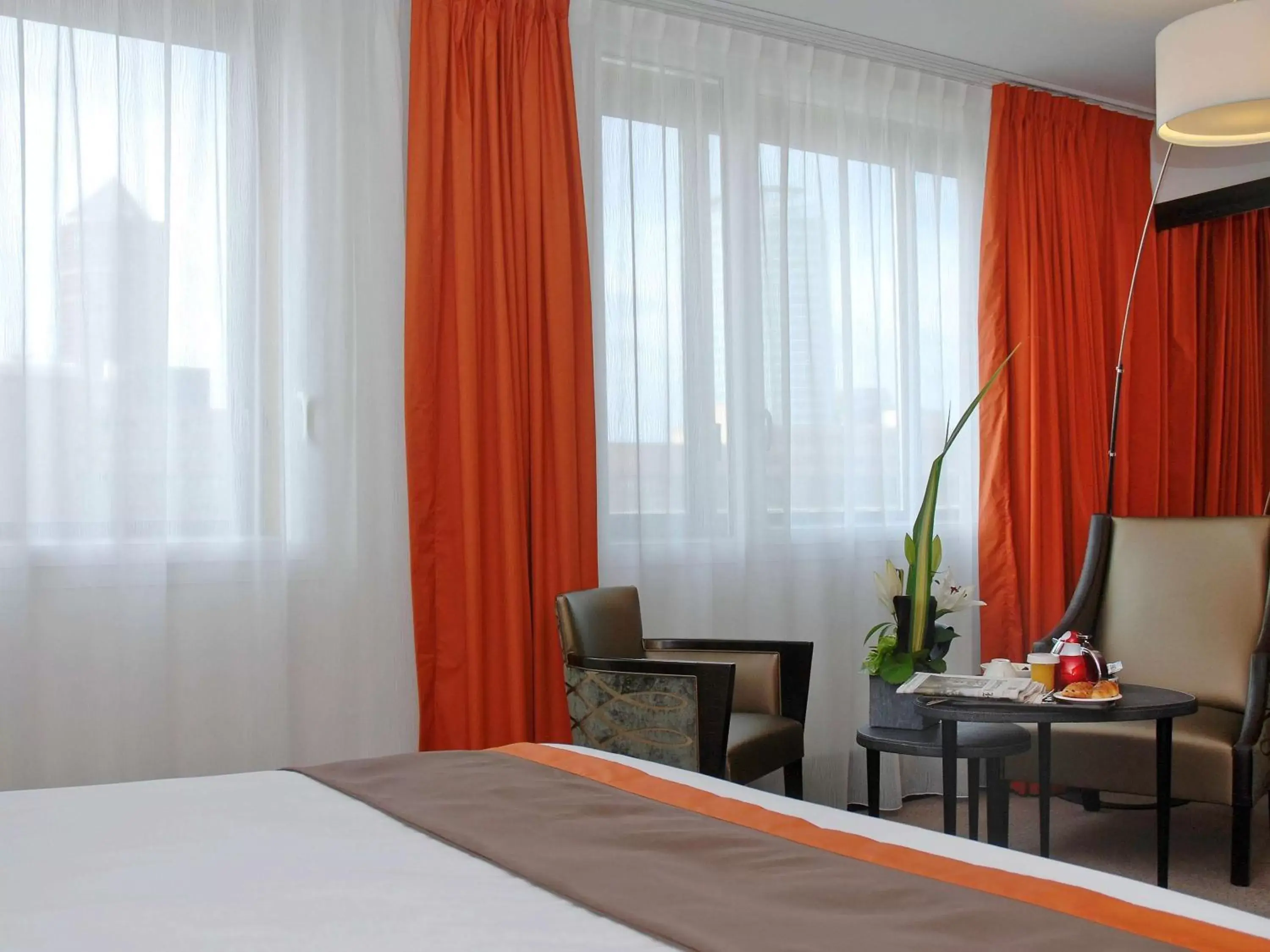 Photo of the whole room, Bed in Mercure Lyon Centre - Gare Part Dieu