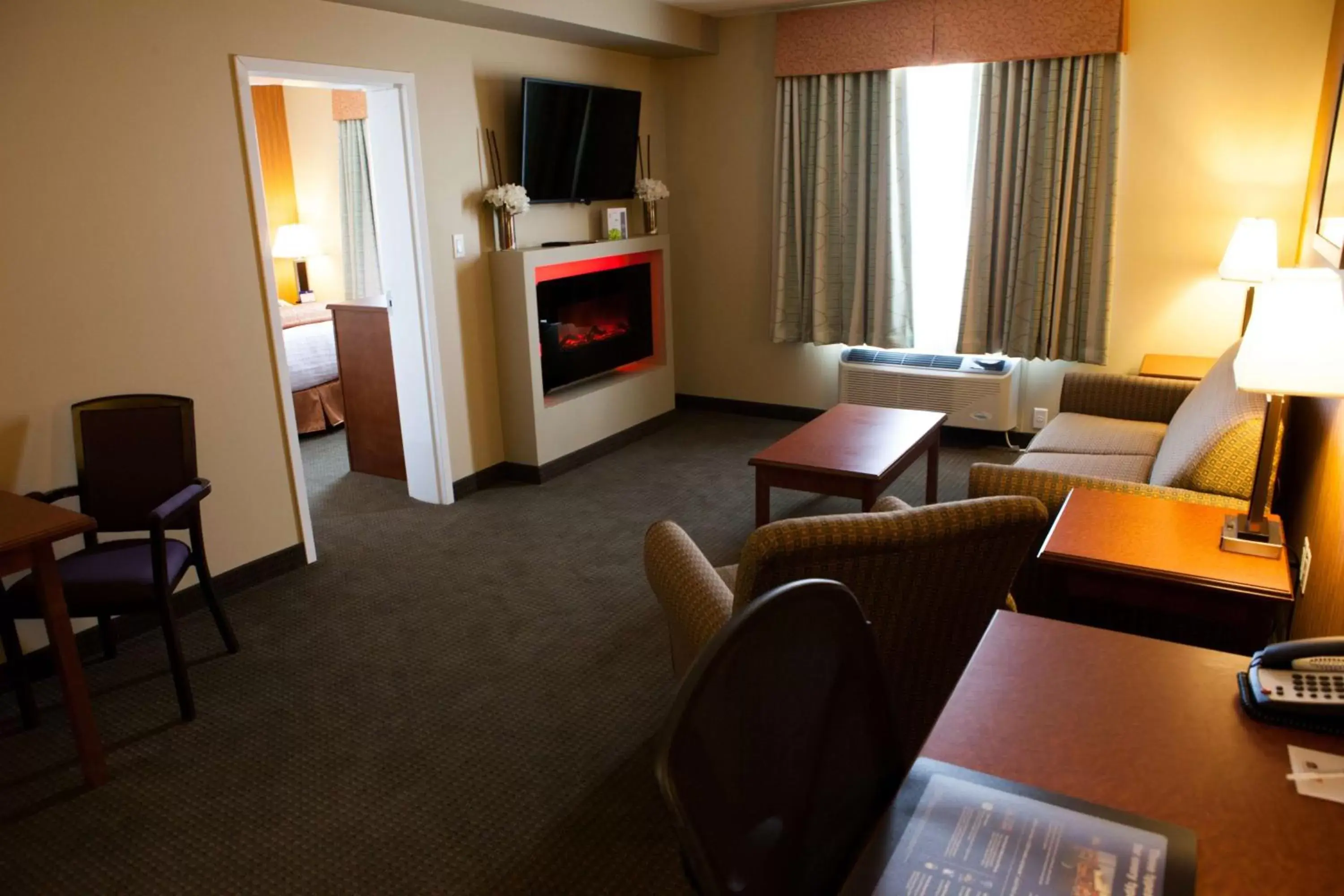 Photo of the whole room, TV/Entertainment Center in Best Western Plus Service Inn & Suites