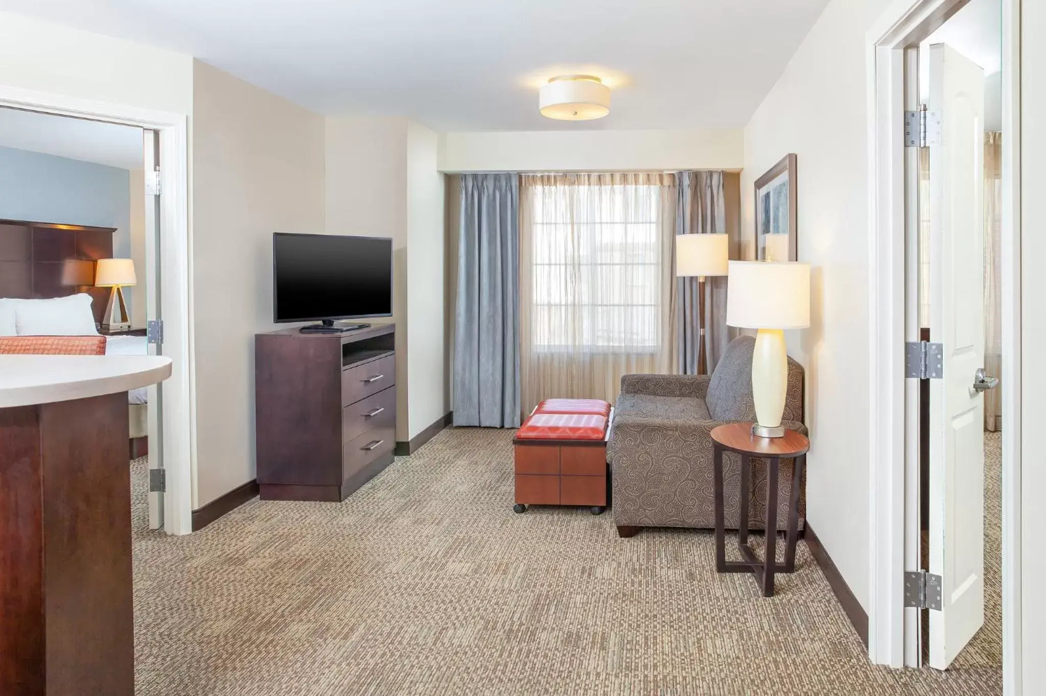Photo of the whole room, TV/Entertainment Center in Staybridge Suites Denver - Central Park, an IHG Hotel