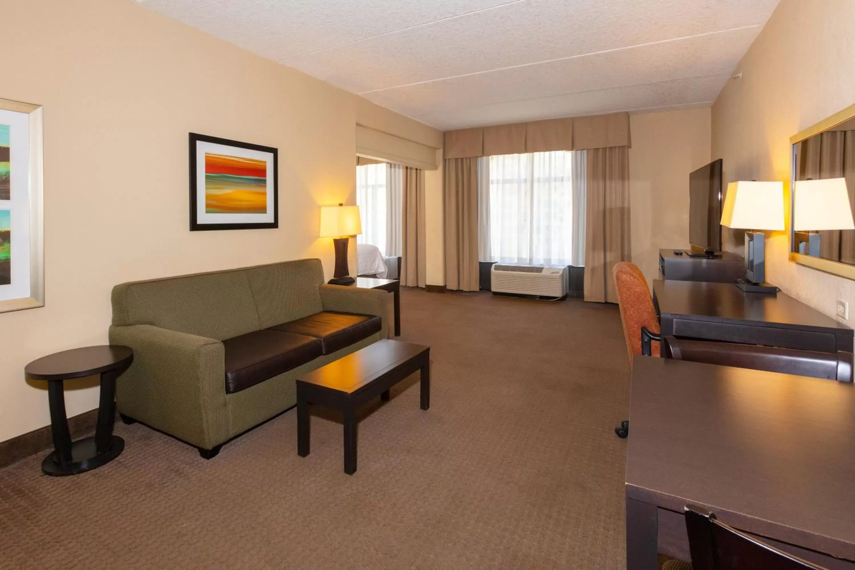 Photo of the whole room, Seating Area in Holiday Inn Express Hotel & Suites Jacksonville Airport, an IHG Hotel