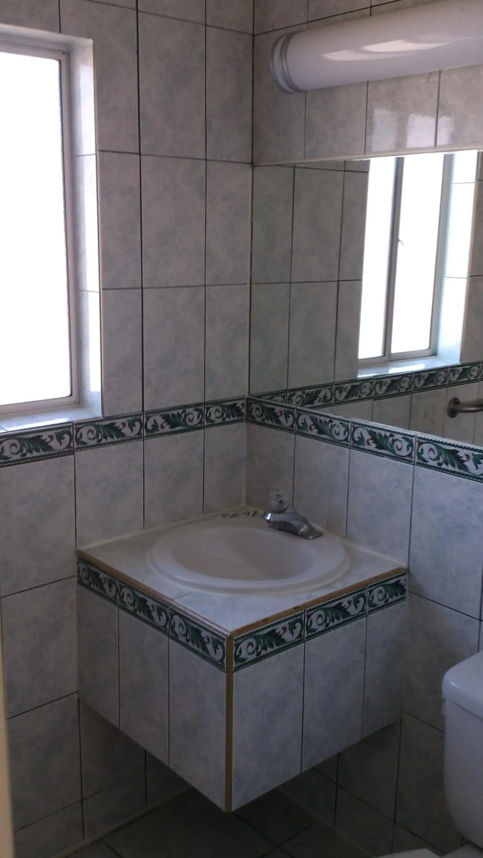 Bathroom in Santa Ana Travel Inn