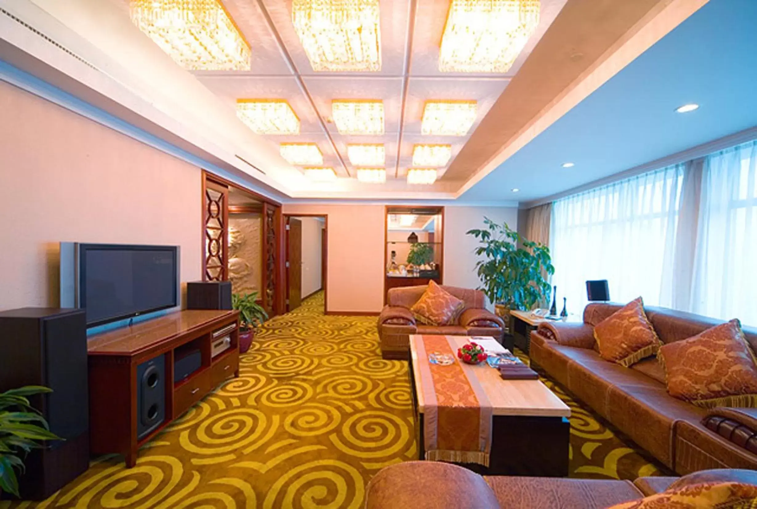 Photo of the whole room, Seating Area in Ramada by Wyndham Pearl Guangzhou-Canton Fair Free Shuttle Bus