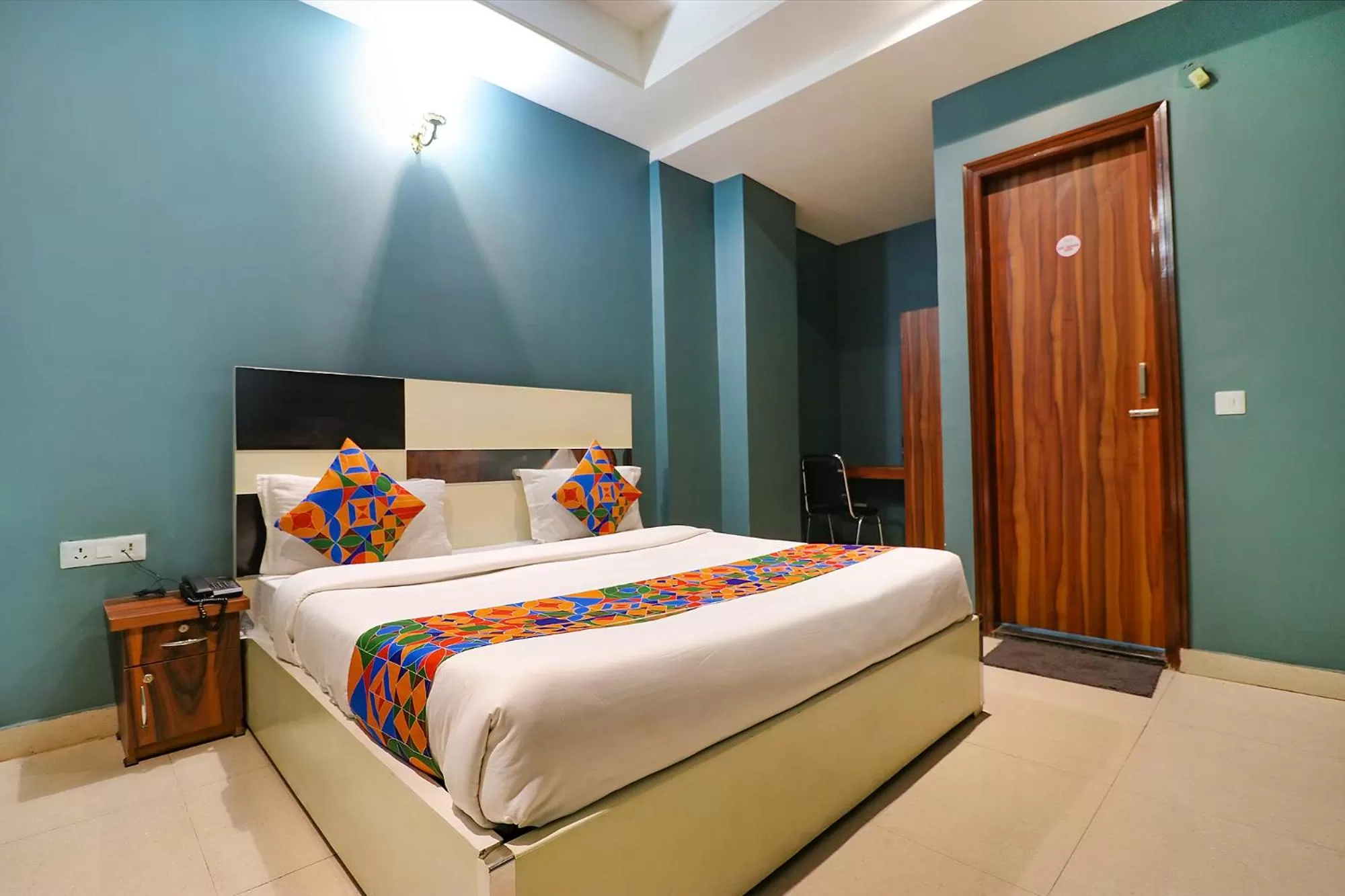 Communal lounge/ TV room, Bed in FabHotel Maxx Inn