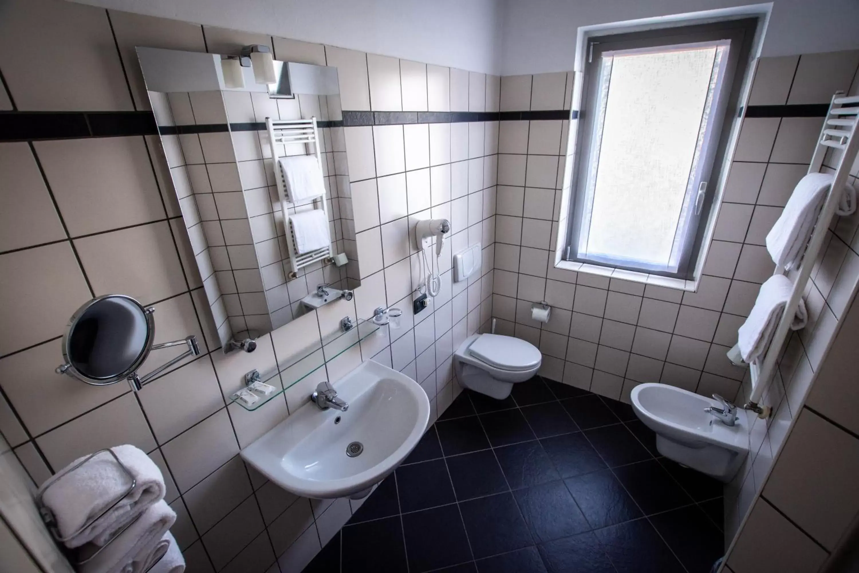 Bathroom in AgriCamping AlbaVillage Hotel & Wellness