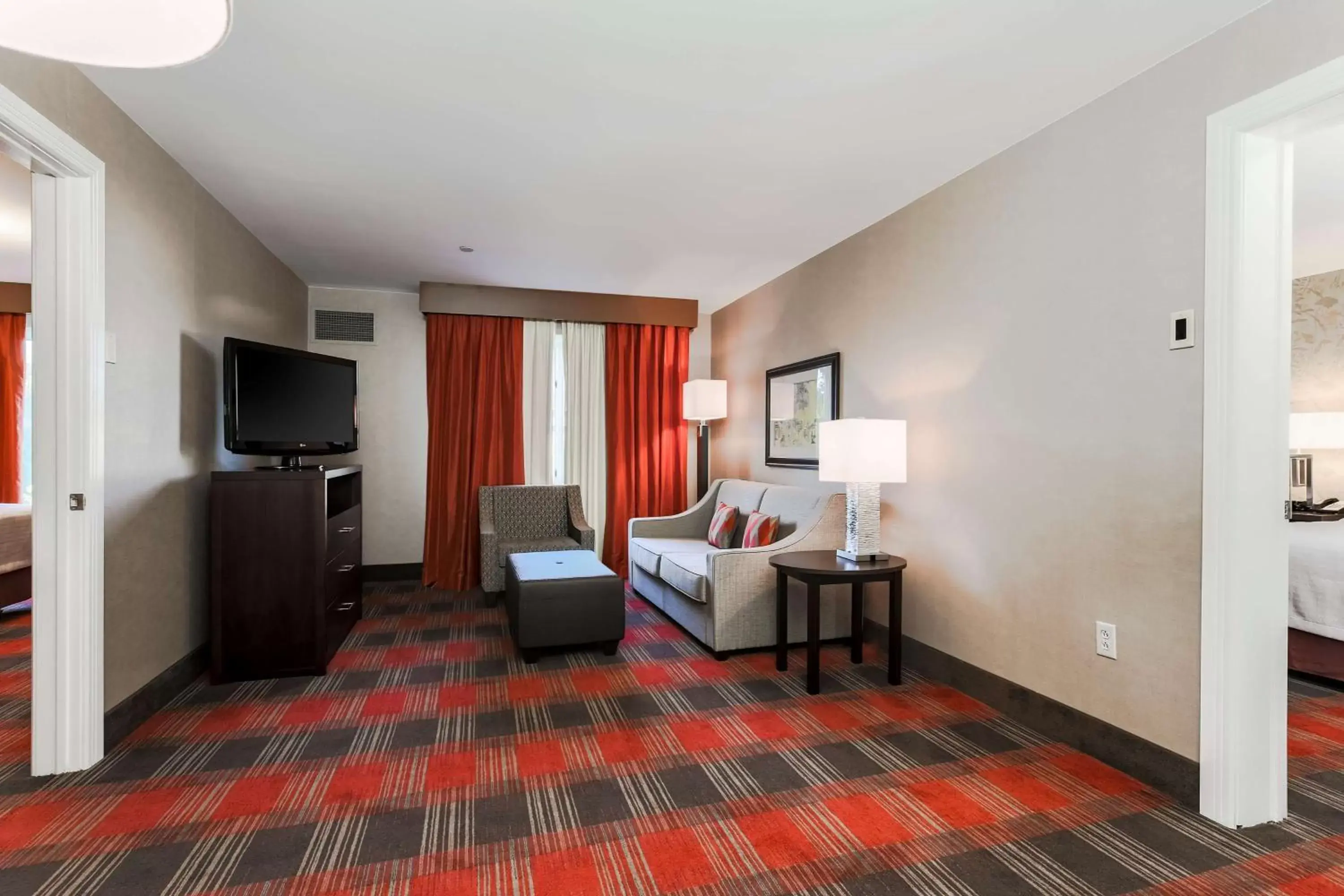 Living room, Seating Area in Homewood Suites by Hilton Long Island-Melville