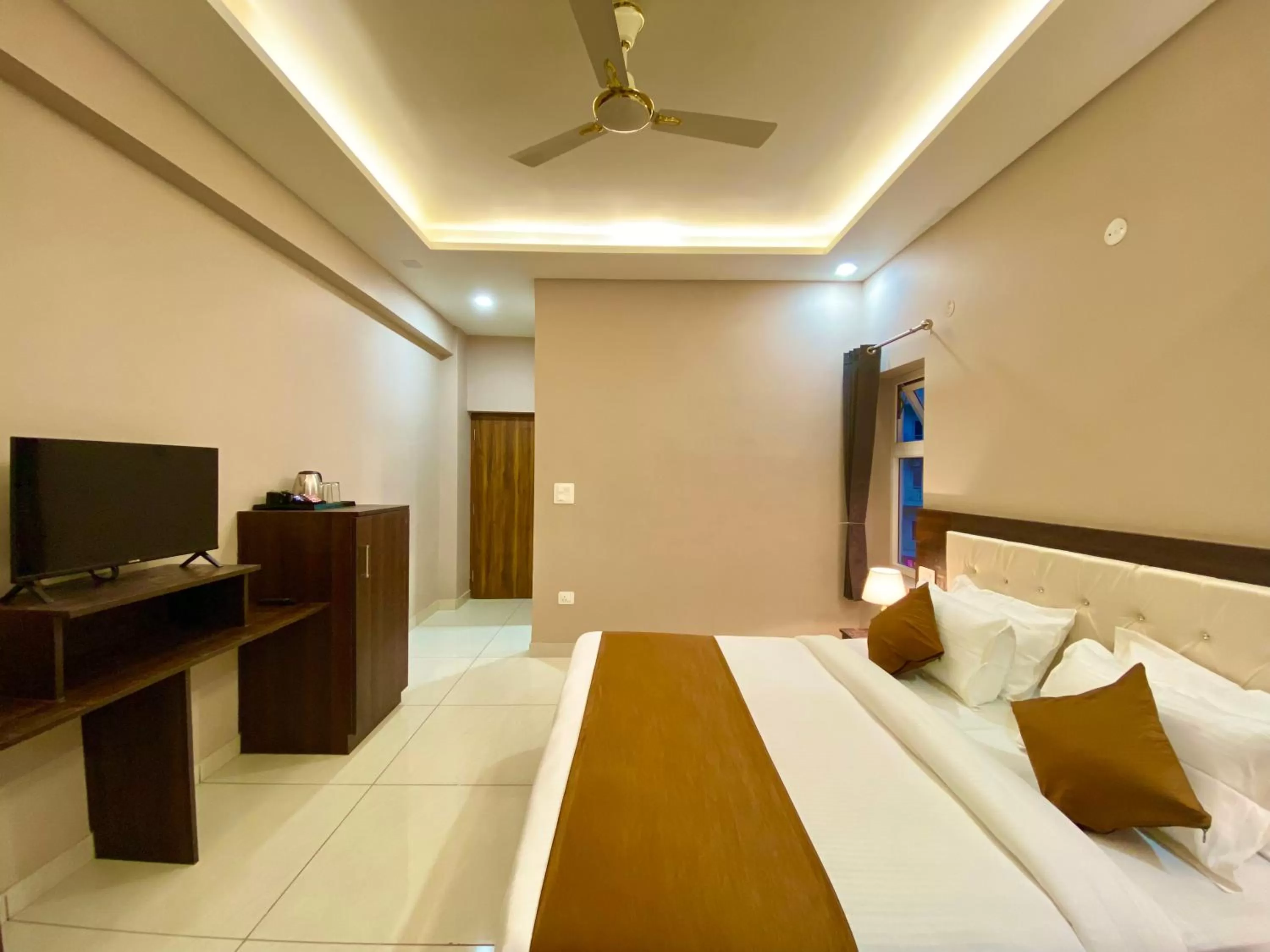 Photo of the whole room in Hotel Shiv Inn Near Secret Waterfall