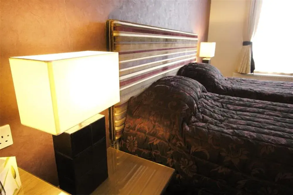 Decorative detail, Bed in Albert Hotel