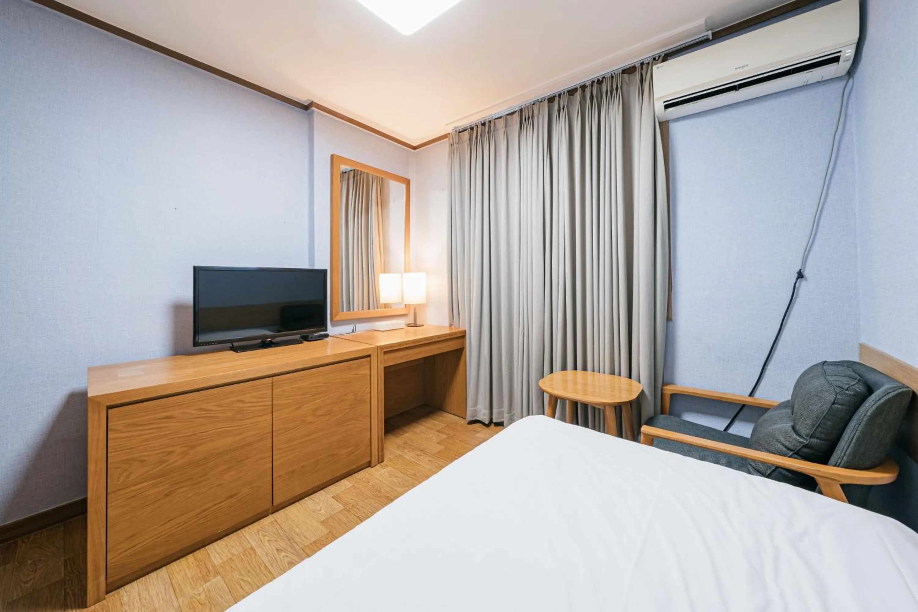 Bed in Jeju Miracle Hotel