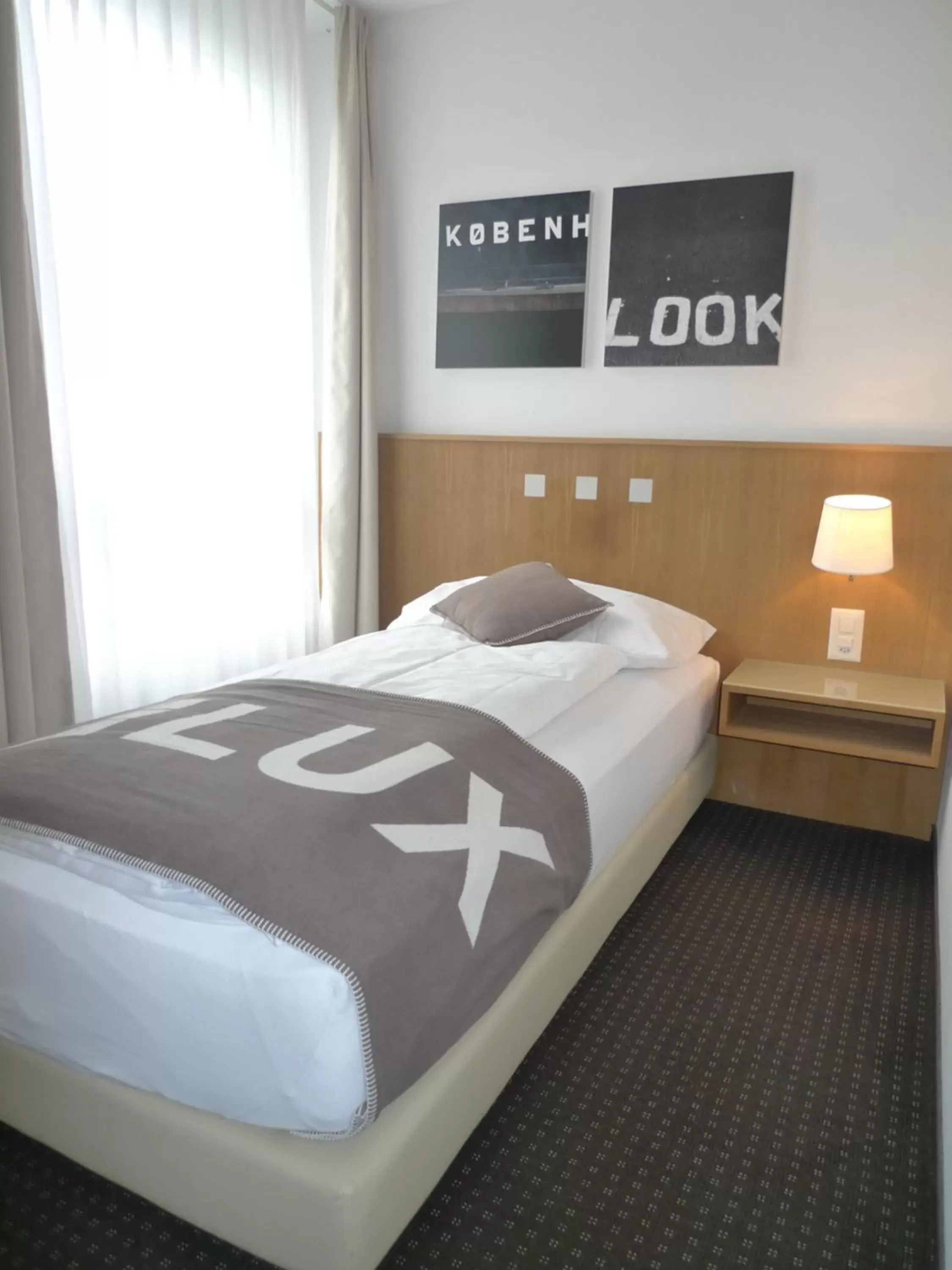 Bed in Businesshotel Lux