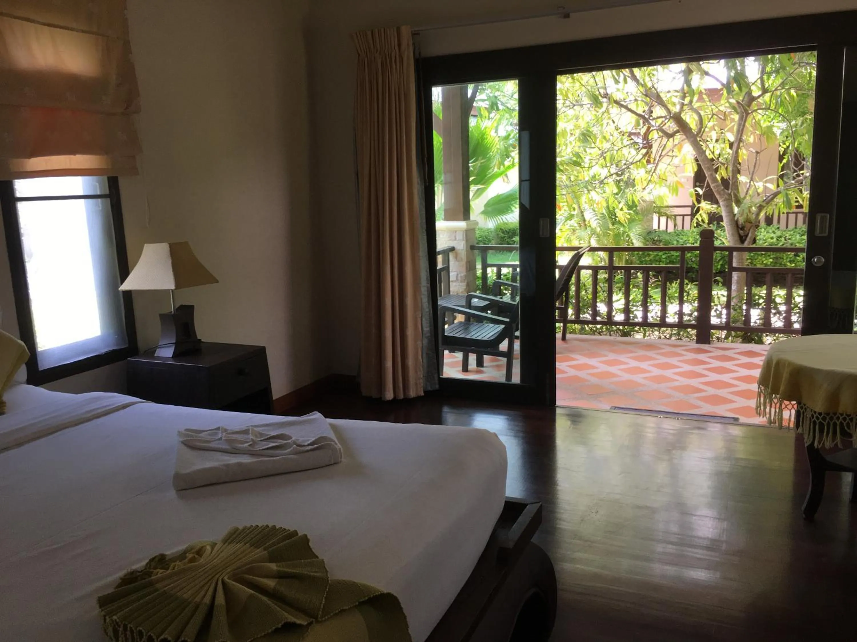 Balcony/Terrace, Bed in Grand Manita Beach Resort