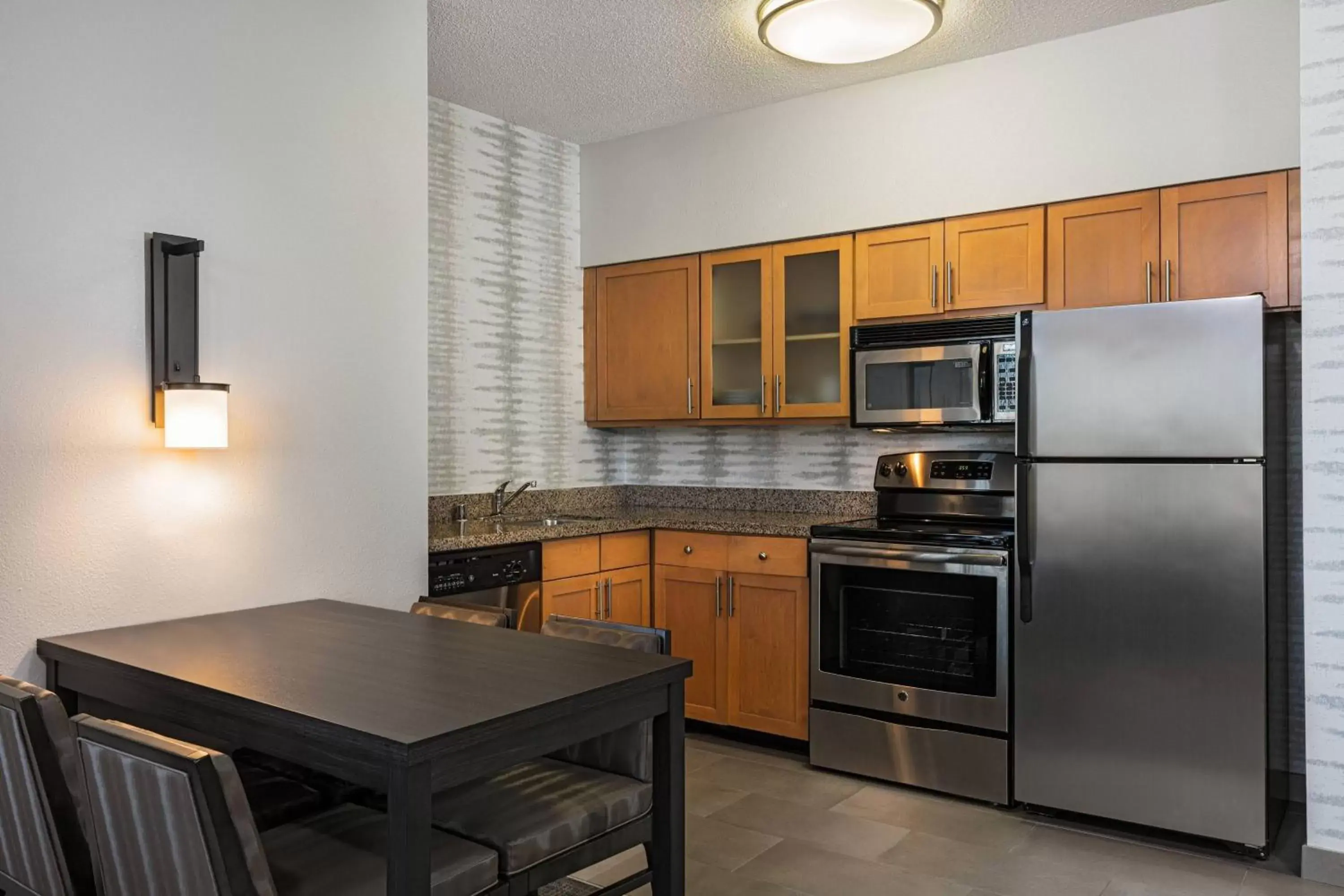 Bedroom, Kitchen/Kitchenette in Residence Inn Louisville Downtown