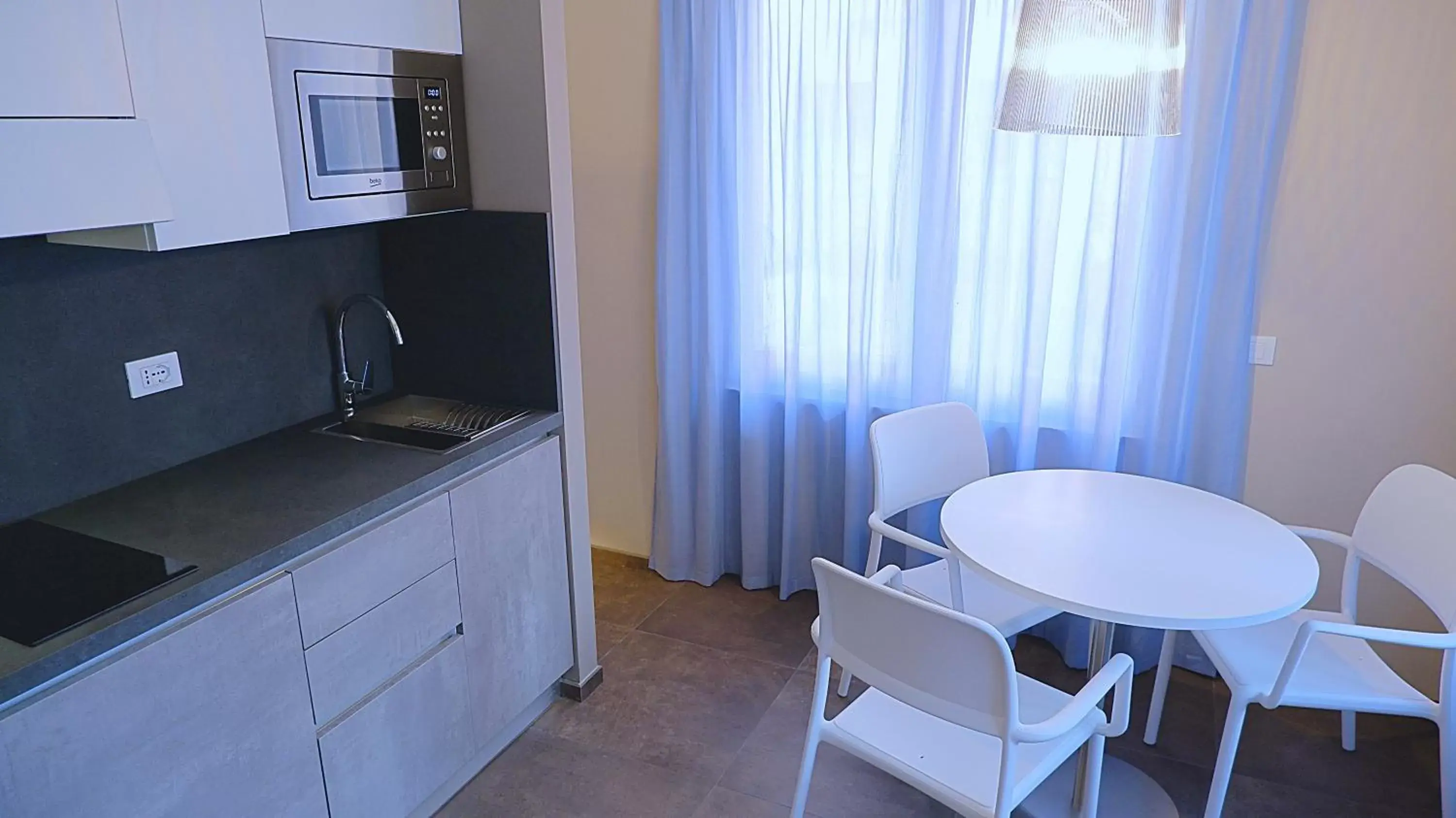 Kitchen/Kitchenette in Pianomare Riviera Apartments and Rooms