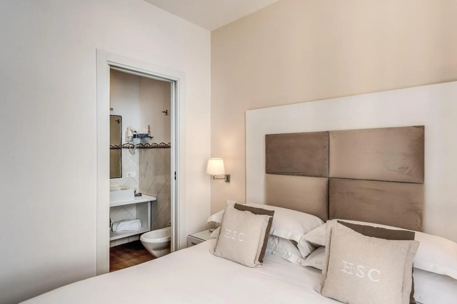 Bed in Hotel Sorrento City