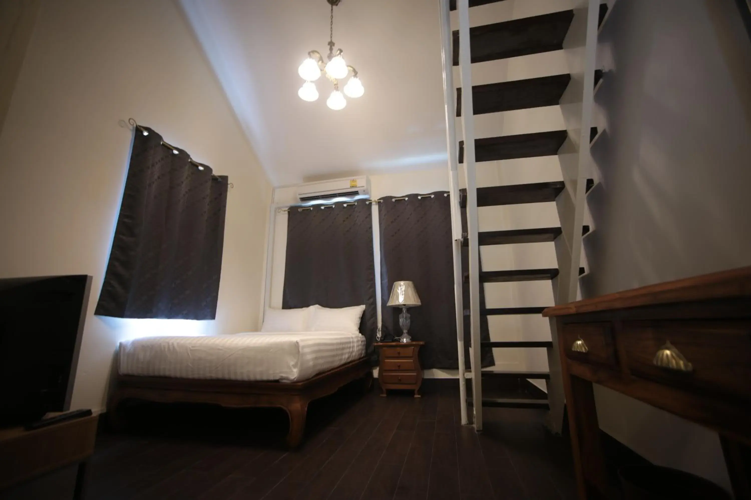 Photo of the whole room, Bed in The Myth-Sud Sathorn