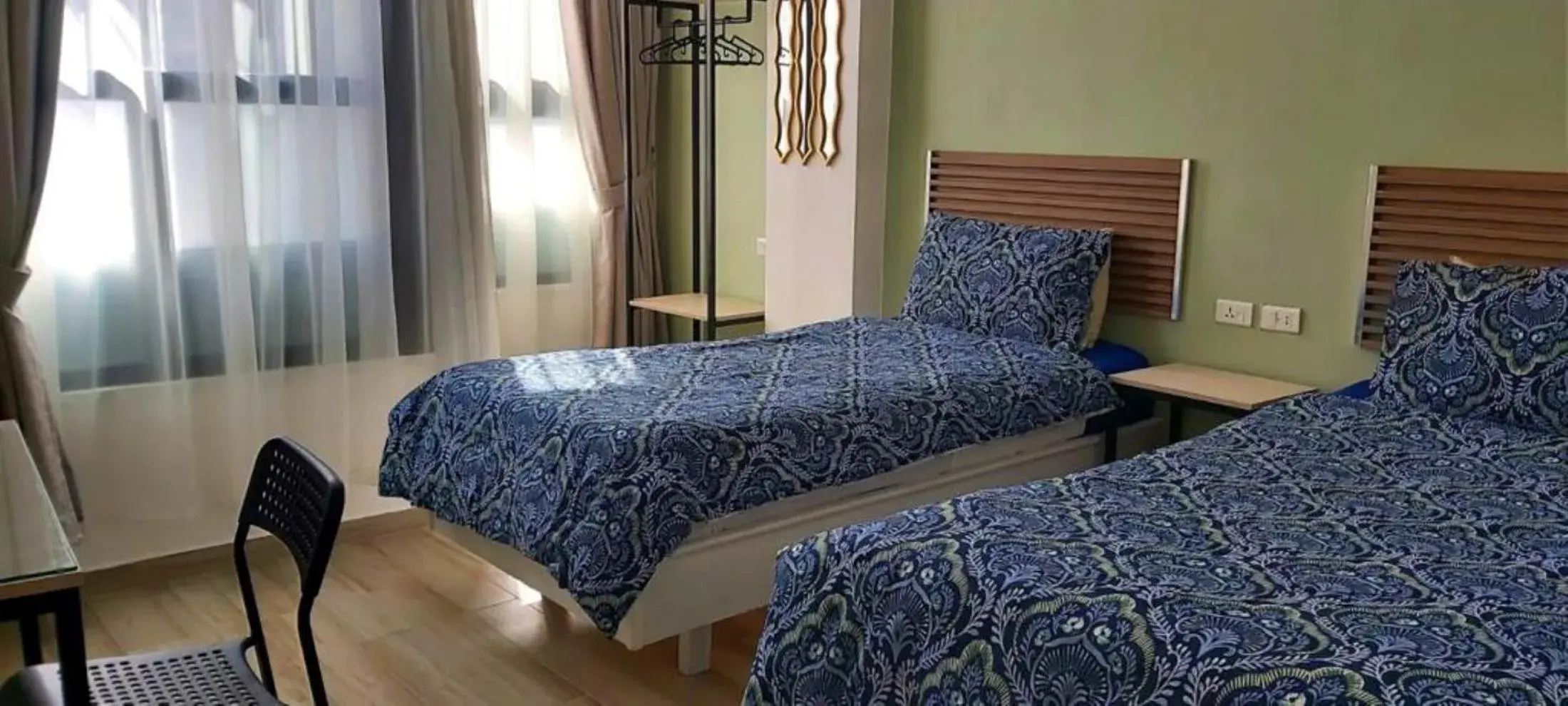 Bed in ARABESQUE HOTEL